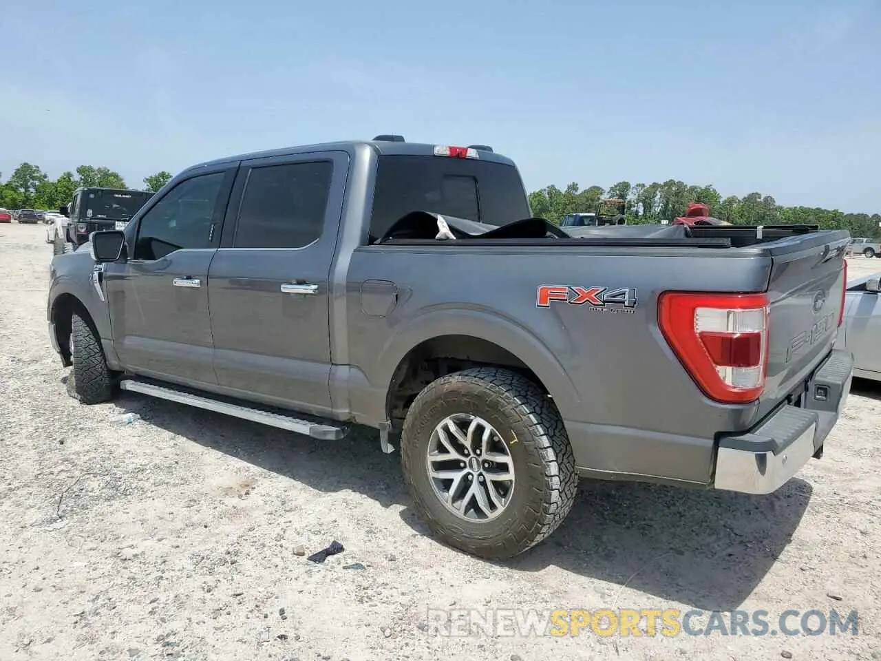 2 Photograph of a damaged car 1FTFW1E81MFA99458 FORD F-150 2021