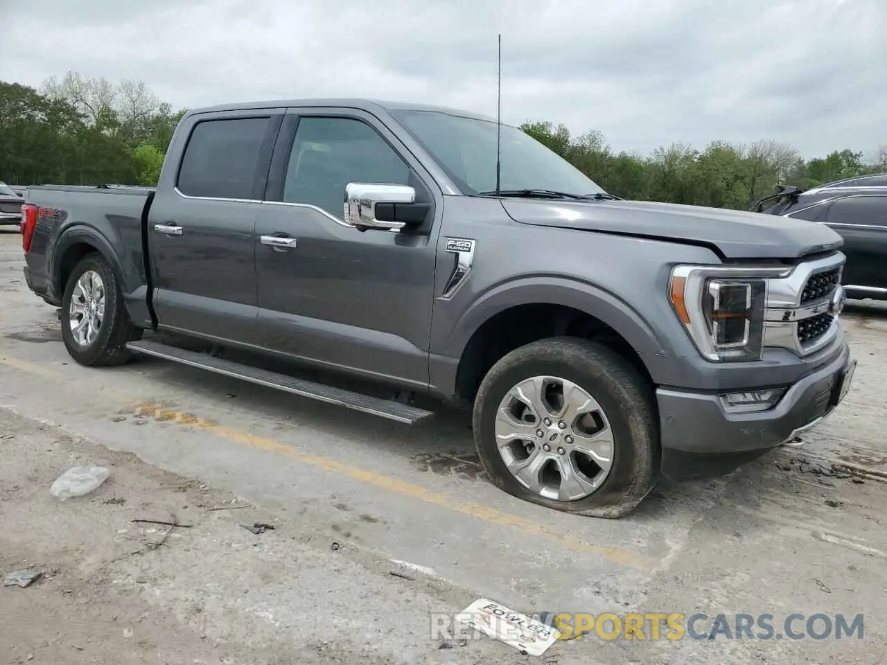 4 Photograph of a damaged car 1FTFW1E84NFB13113 FORD F-150 2022