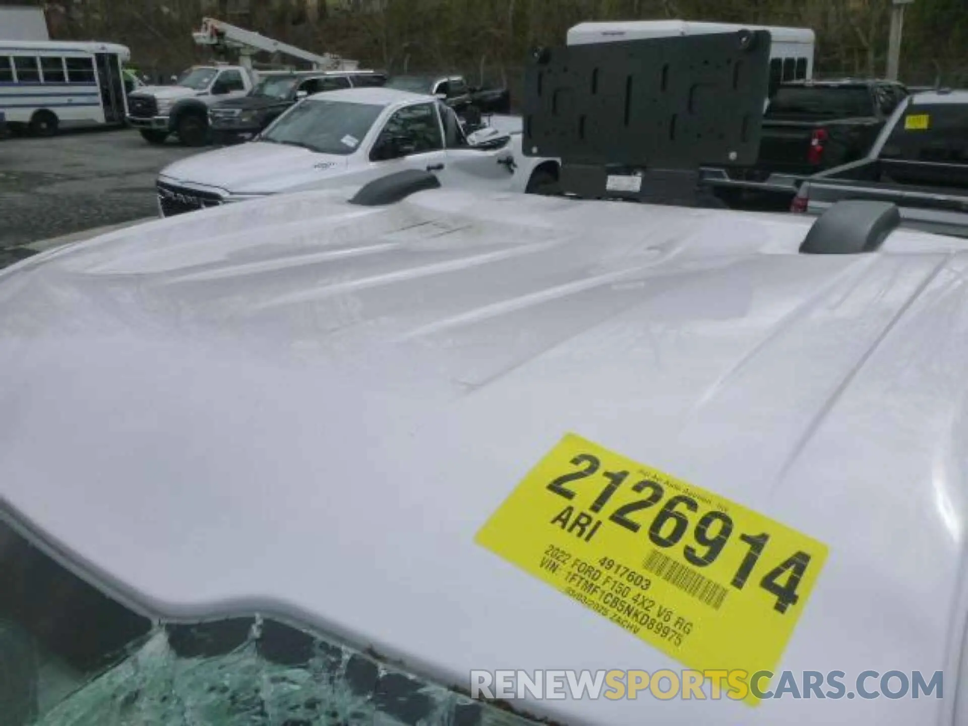 32 Photograph of a damaged car 1FTMF1CB5NKD89975 FORD F-150 2022