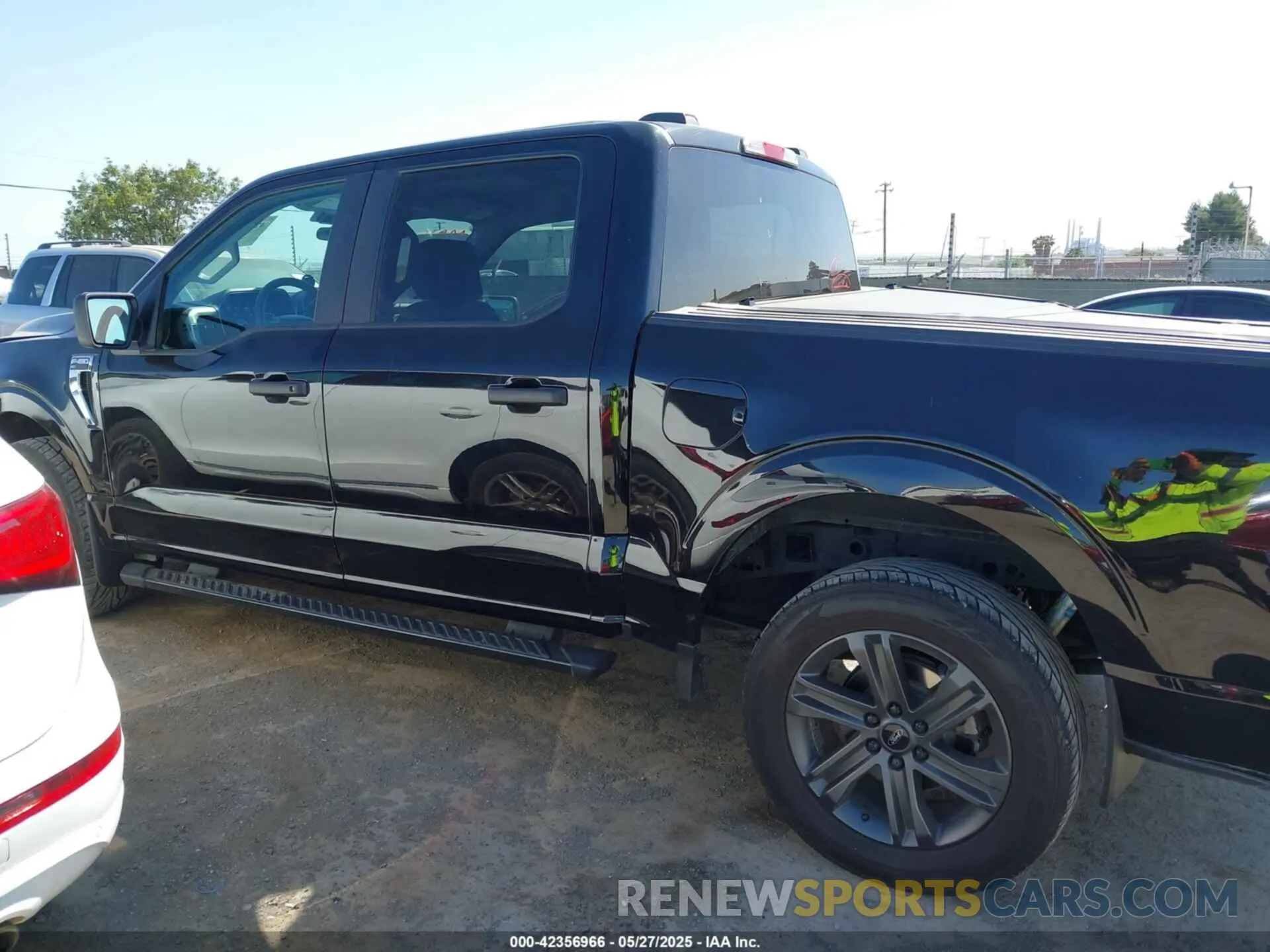 14 Photograph of a damaged car 1FTEW1C80PKD24124 FORD F-150 2023