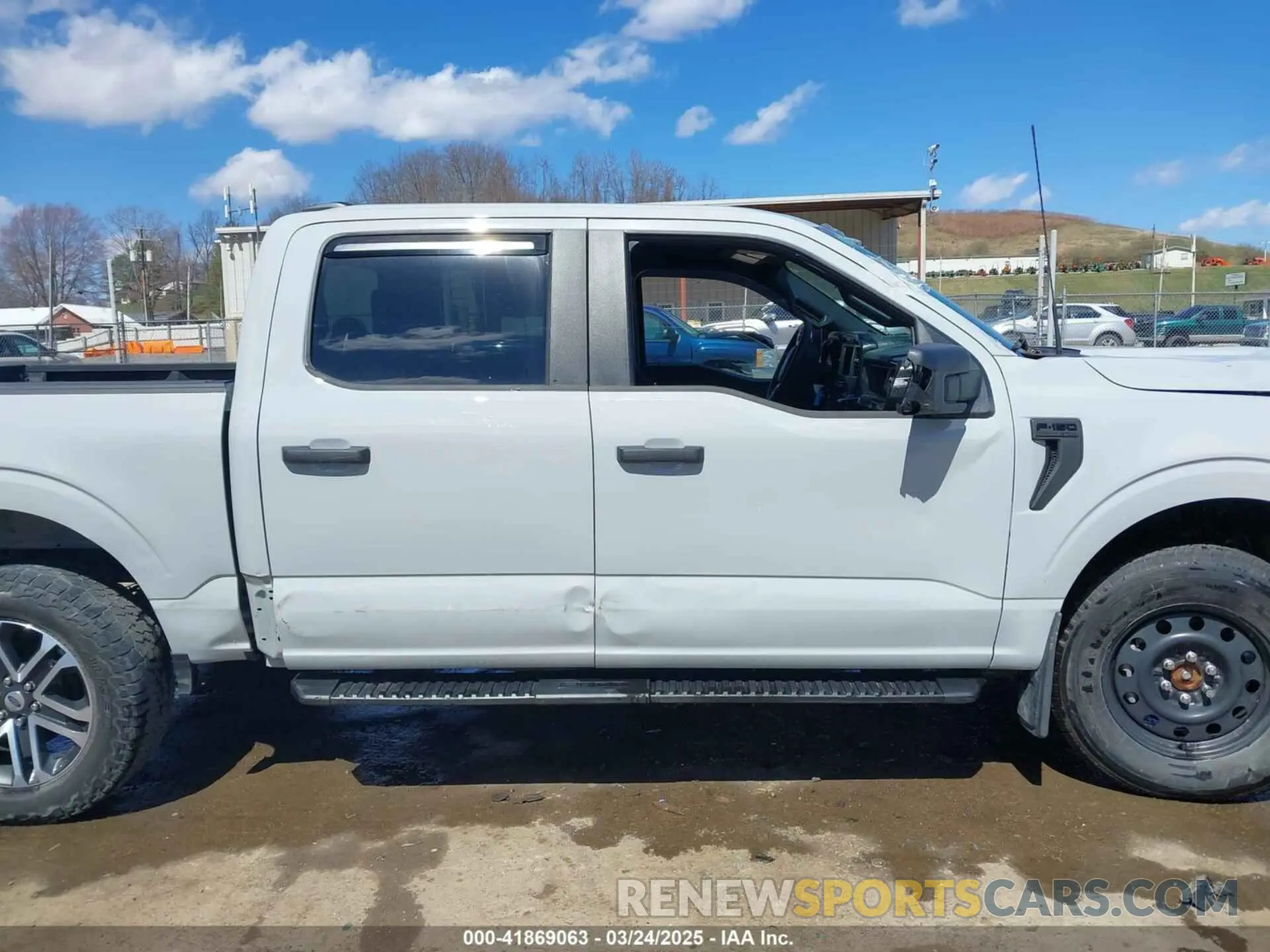 14 Photograph of a damaged car 1FTFW1E51PFB15197 FORD F-150 2023