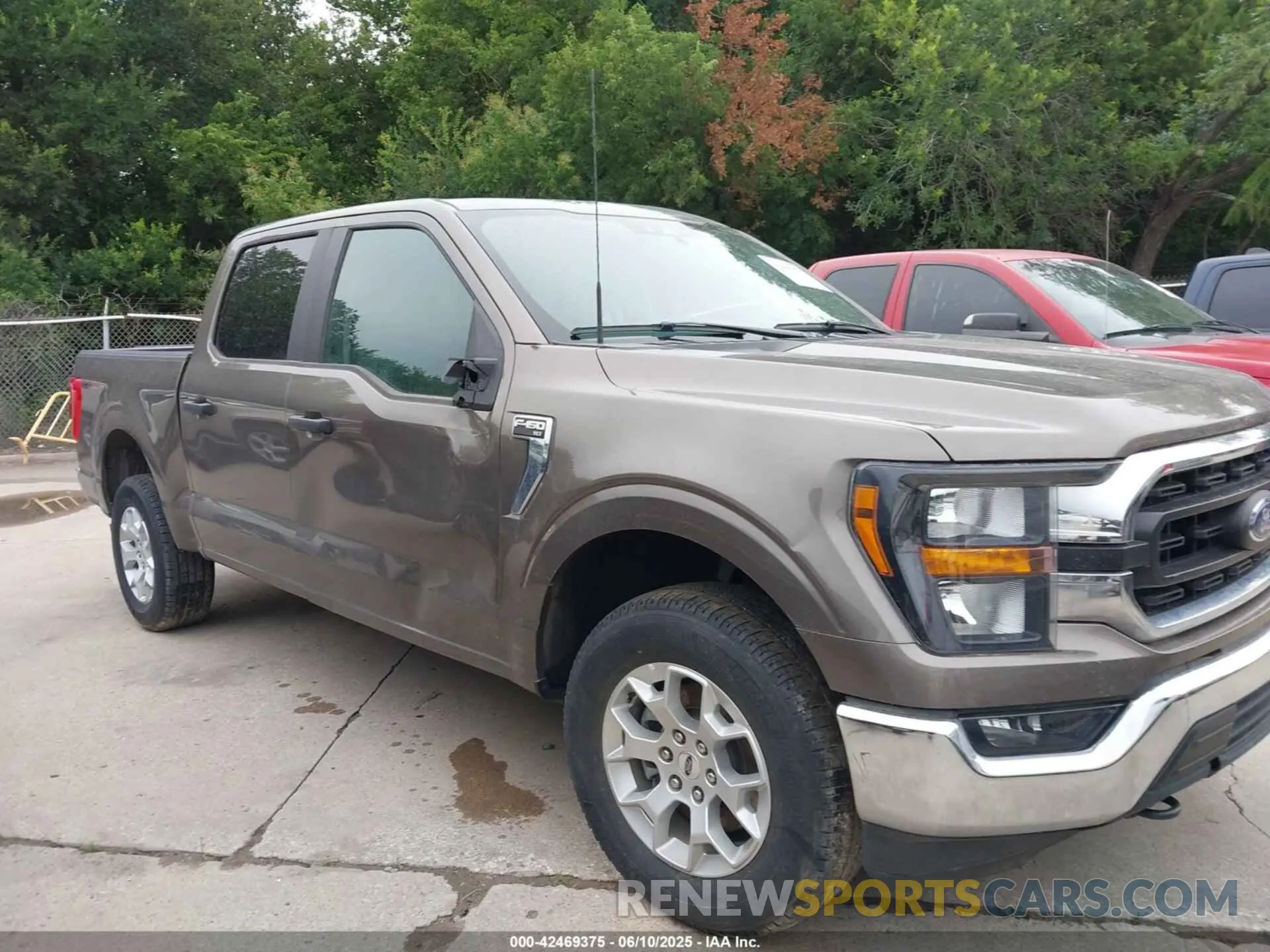 13 Photograph of a damaged car 1FTFW1E51PFC34285 FORD F-150 2023