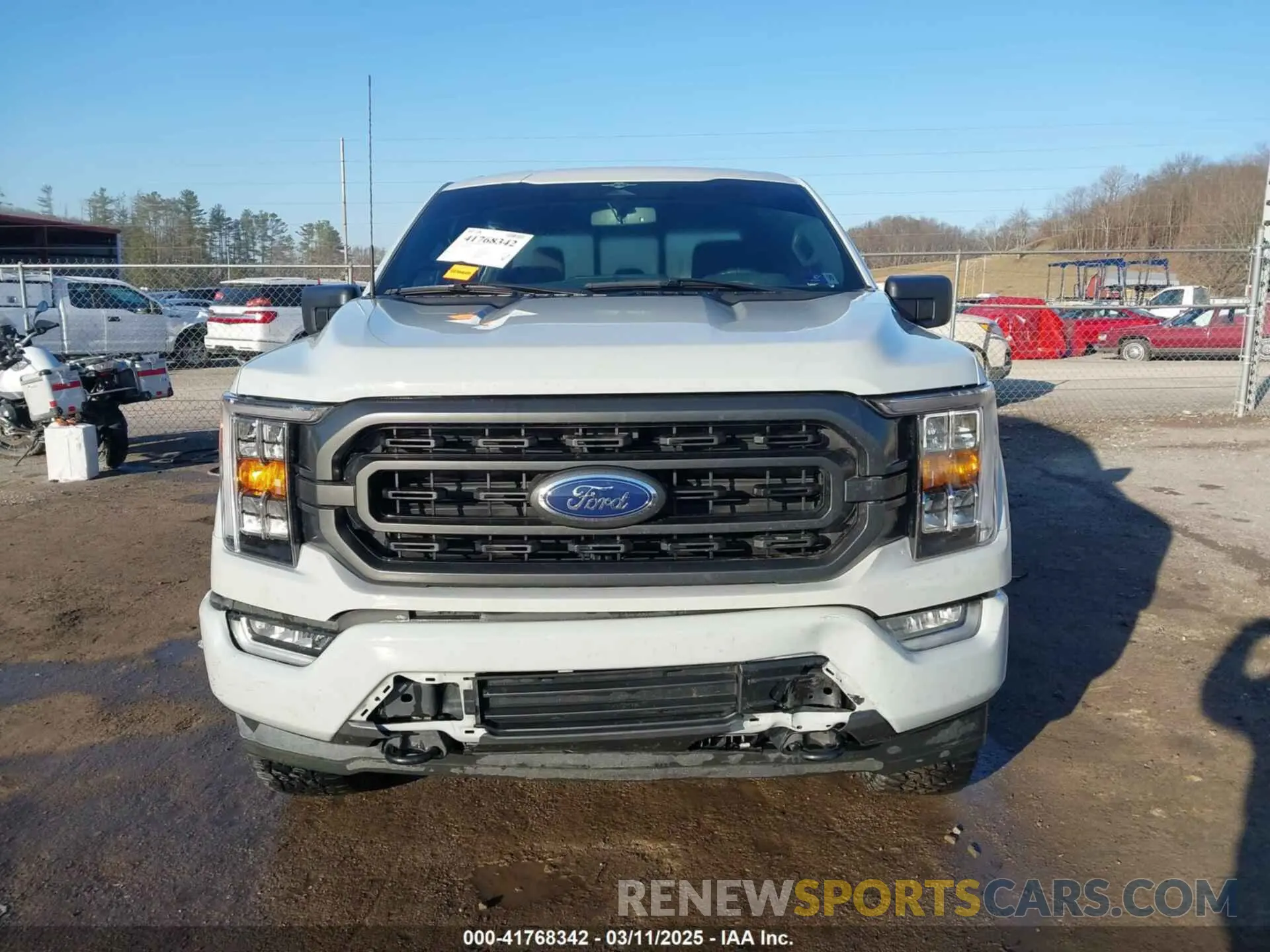 12 Photograph of a damaged car 1FTFW1E58PFB33406 FORD F-150 2023