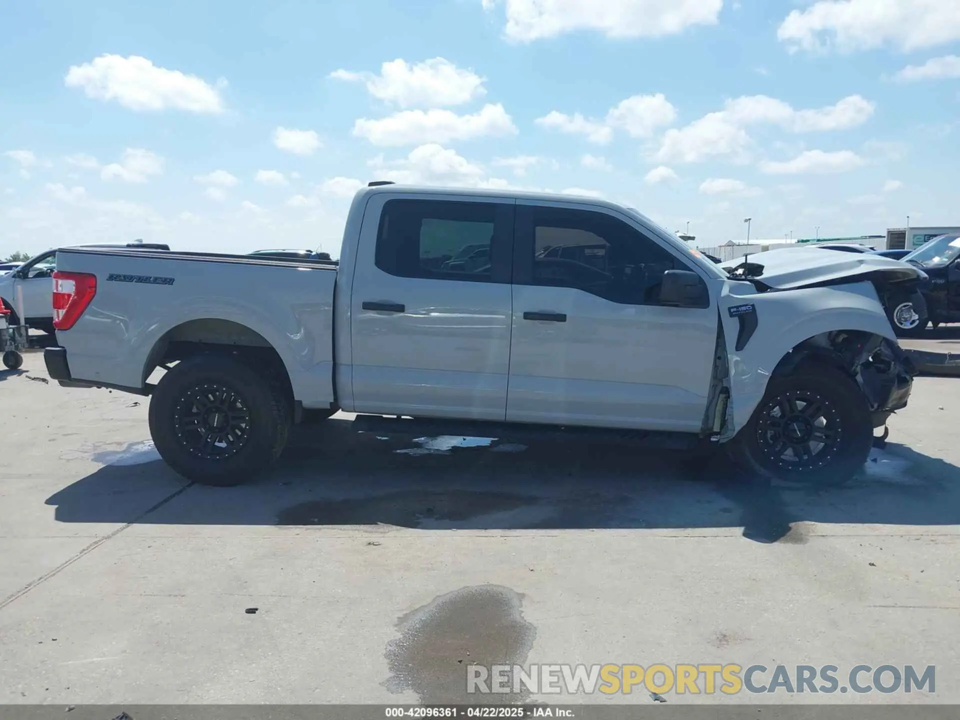 14 Photograph of a damaged car 1FTFW1E84PFA48461 FORD F-150 2023