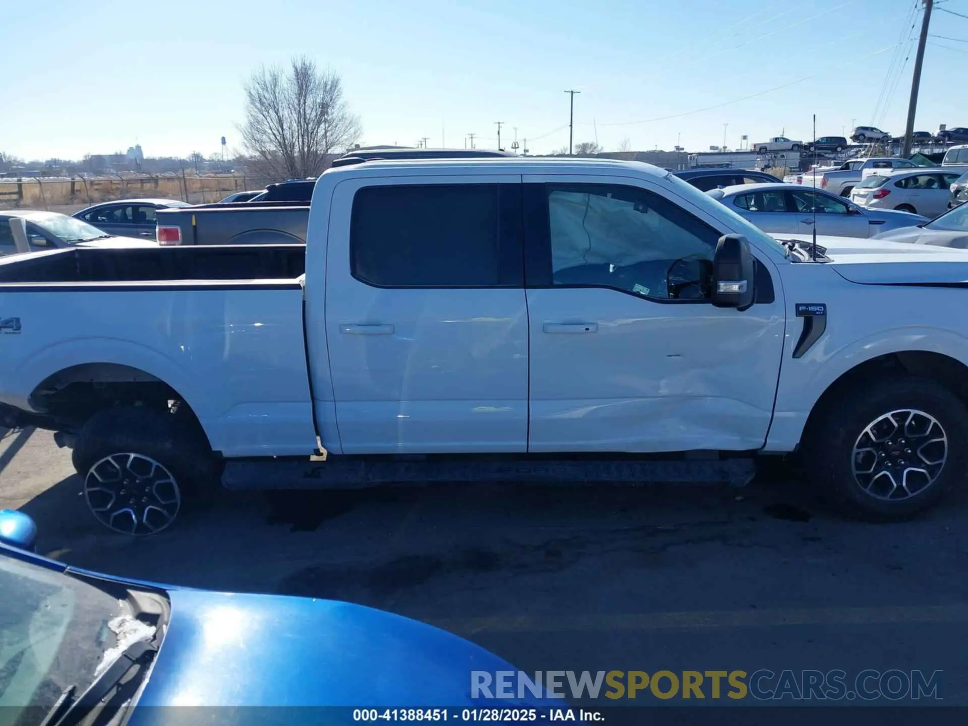 13 Photograph of a damaged car 1FTFW1E87PFB31057 FORD F-150 2023