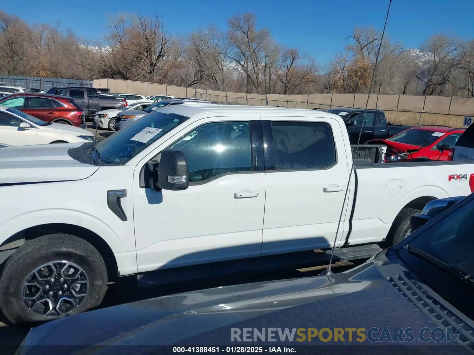 14 Photograph of a damaged car 1FTFW1E87PFB31057 FORD F-150 2023