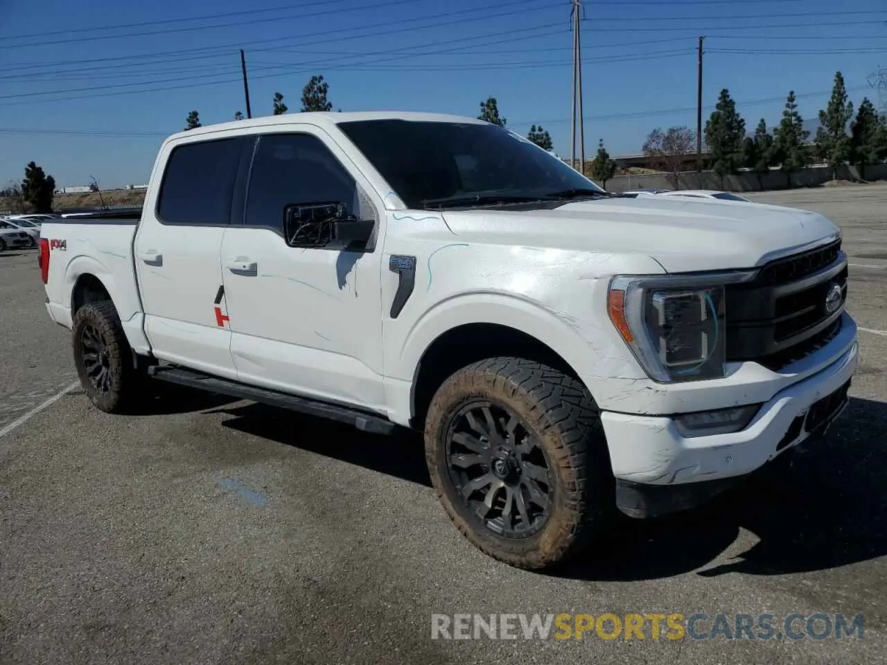 4 Photograph of a damaged car 1FTFW1E88PFA47488 FORD F-150 2023