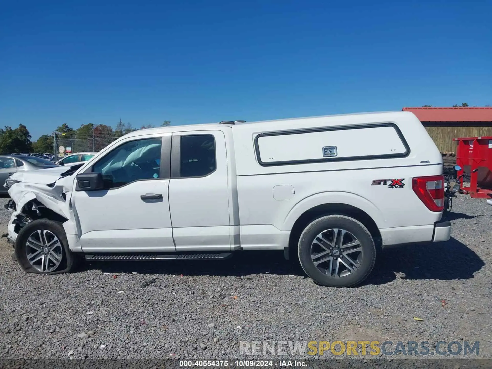14 Photograph of a damaged car 1FTFX1E55PKE79742 FORD F-150 2023