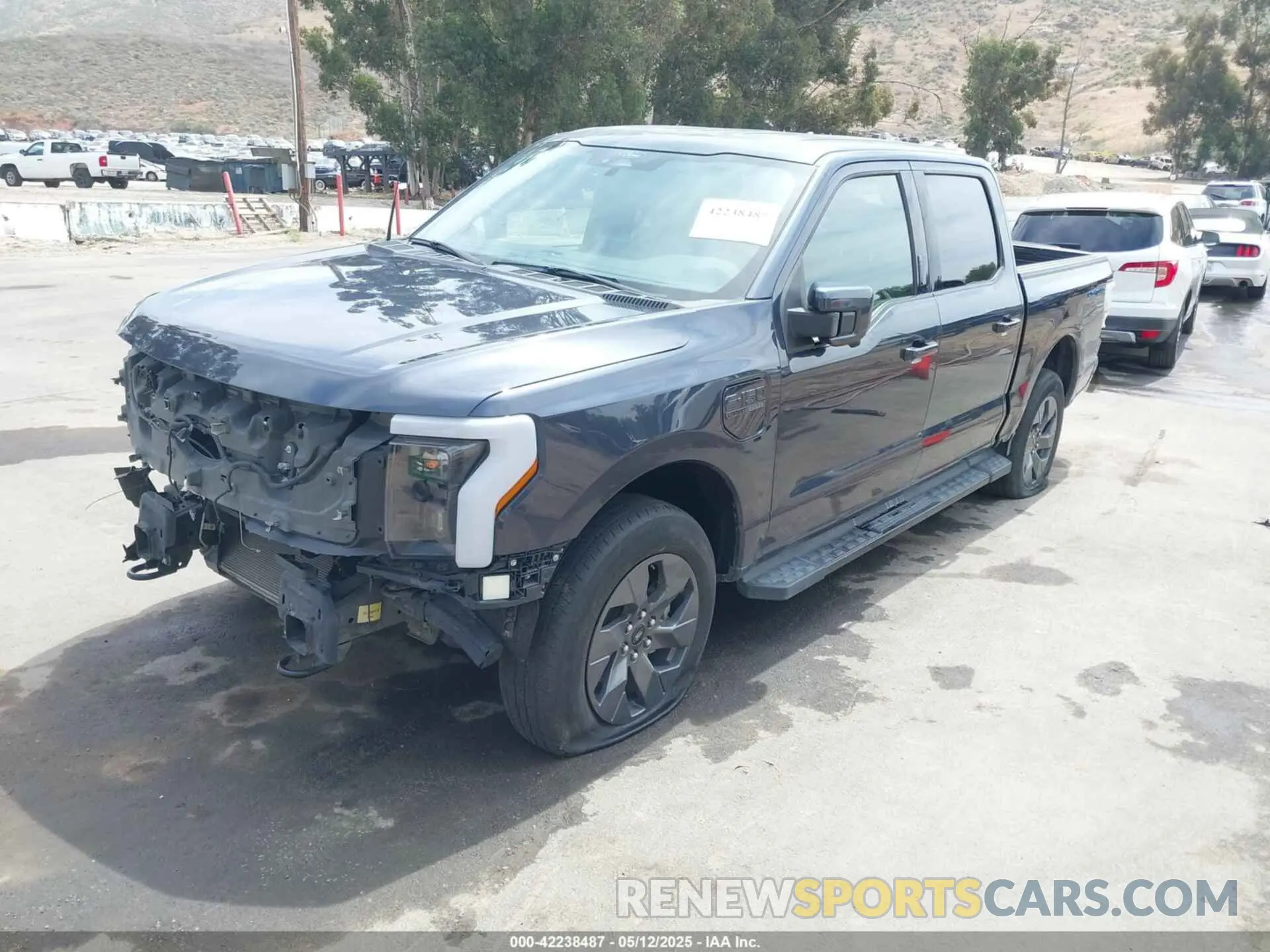 2 Photograph of a damaged car 1FTVW1EL8NWG14716 FORD F-150 LIGHTNING 2022