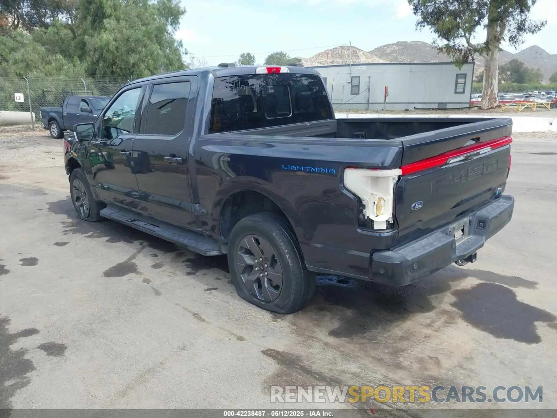3 Photograph of a damaged car 1FTVW1EL8NWG14716 FORD F-150 LIGHTNING 2022