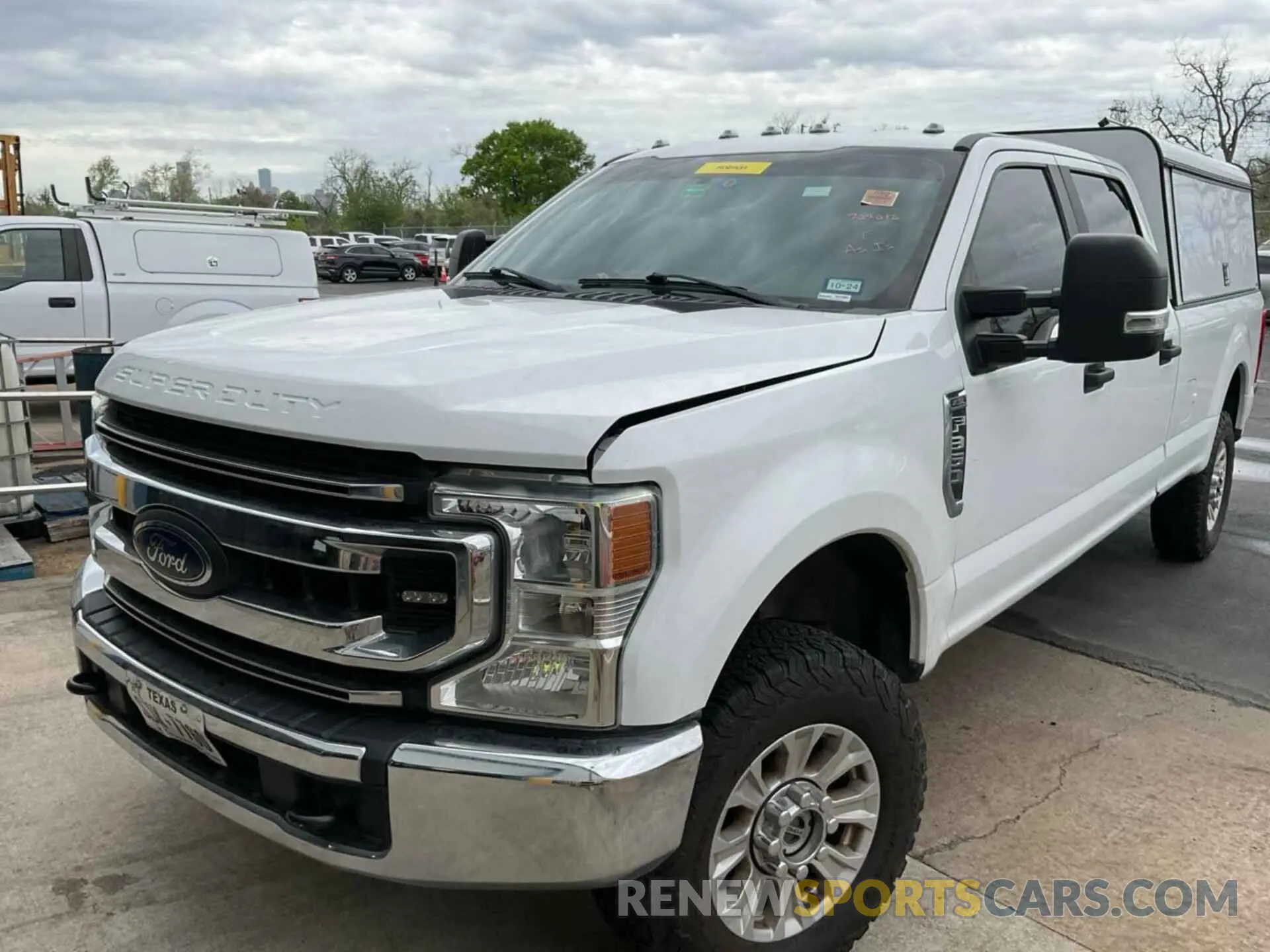 23 Photograph of a damaged car 1FT8W3BN0NED28105 FORD F-350 2022