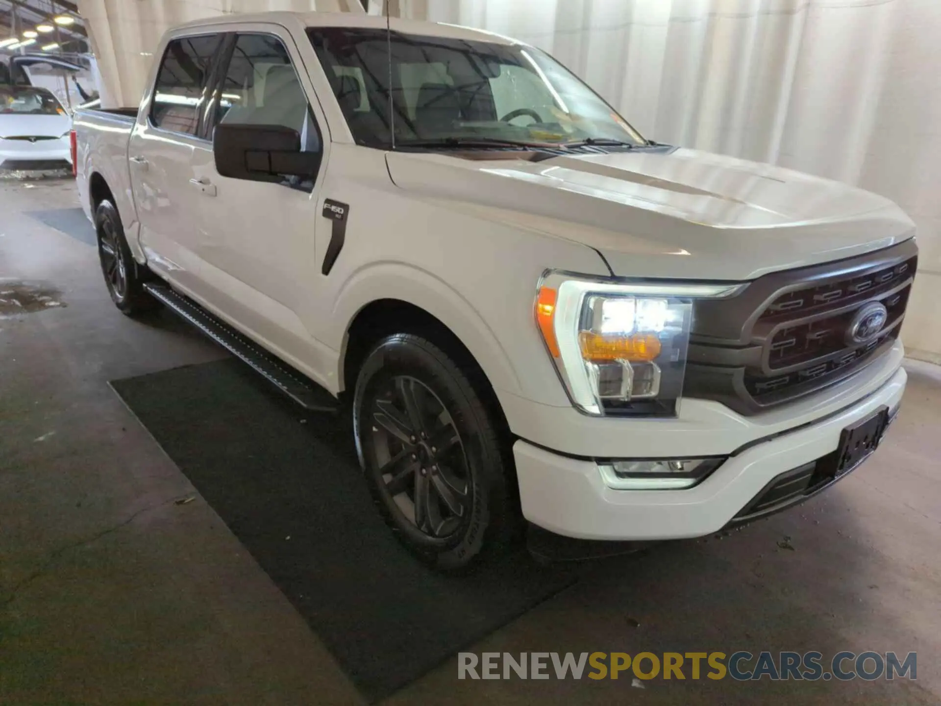 14 Photograph of a damaged car 1FTEW1C80PFA15858 FORD F150 2023