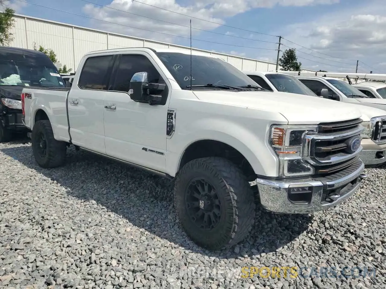 4 Photograph of a damaged car 1FT7W2BT1NED73574 FORD F250 2022