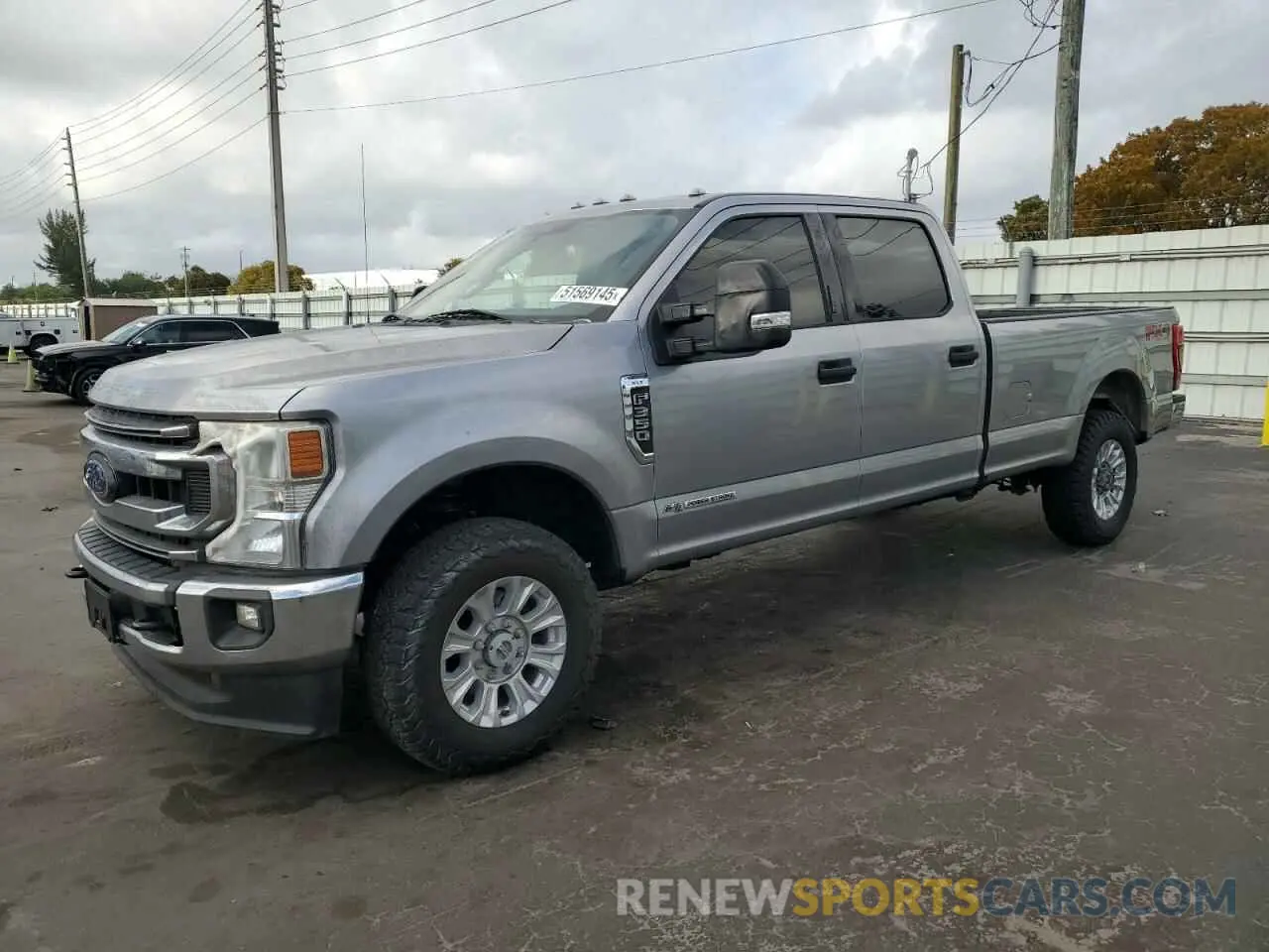 1 Photograph of a damaged car 1FT8W3BT5LED06581 FORD F350 2020