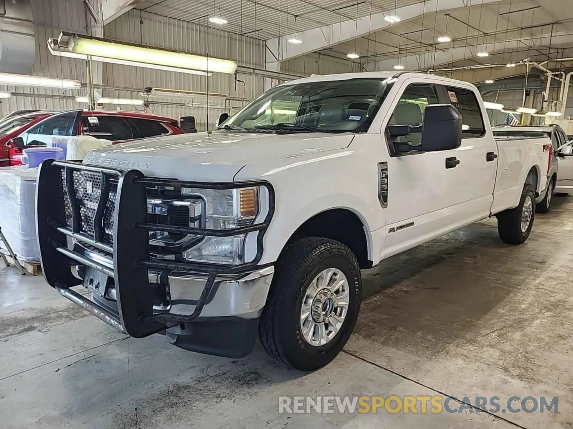 32 Photograph of a damaged car 1FT8W3BT0MEE10543 FORD F350 2021
