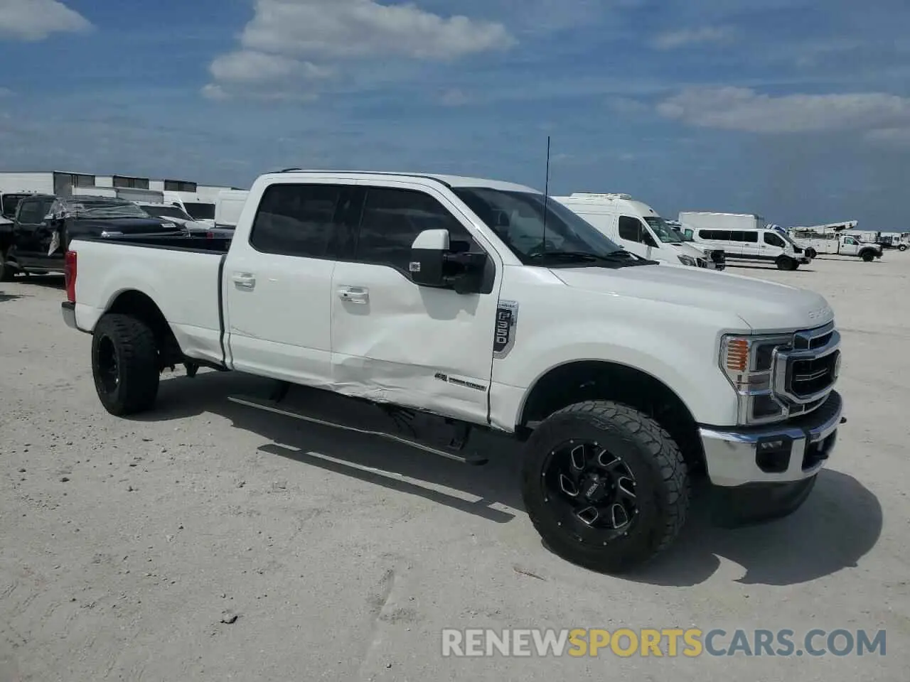 4 Photograph of a damaged car 1FT8W3BT1NEC82797 FORD F350 2022