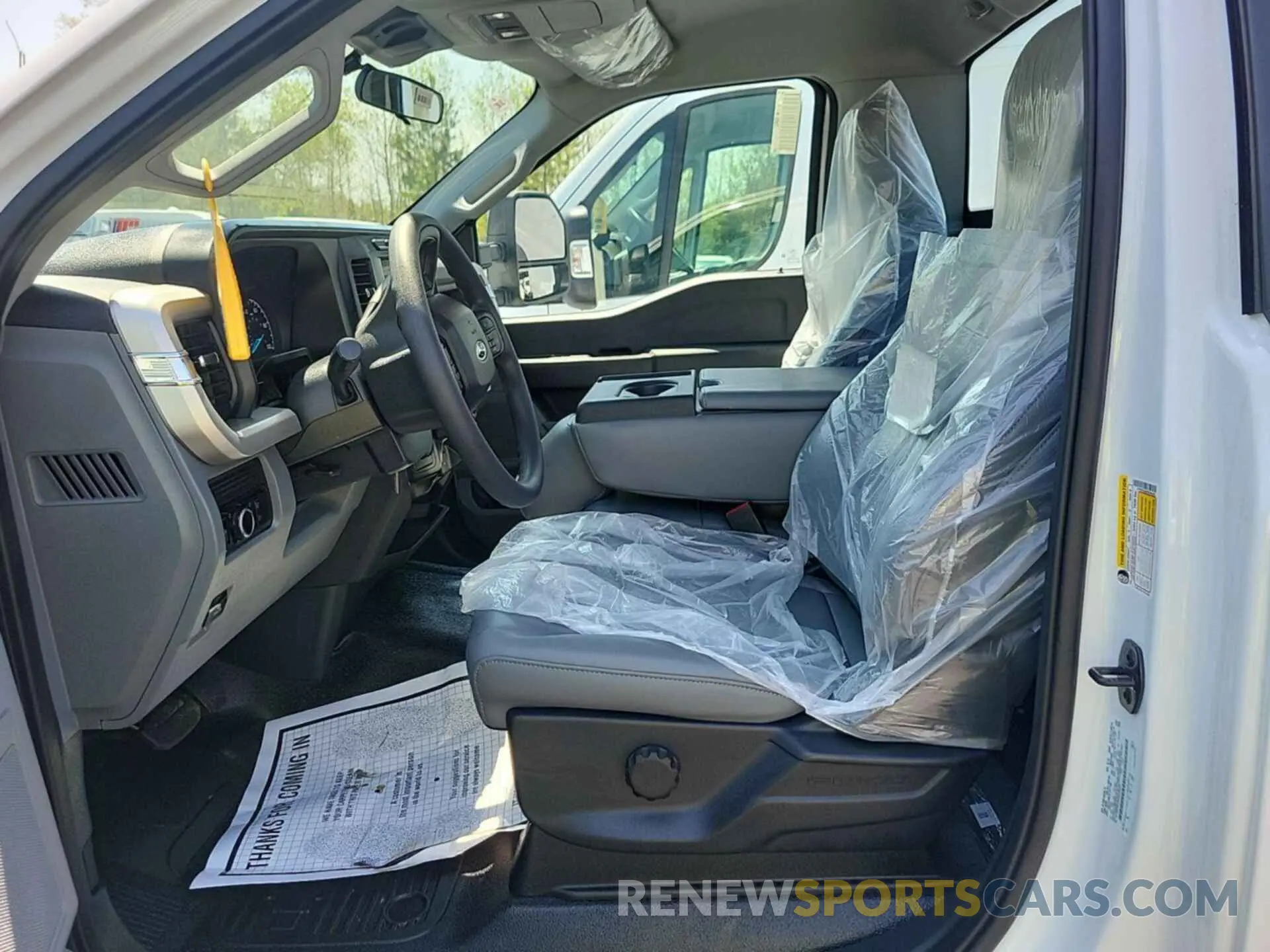 7 Photograph of a damaged car 1FTRF3CA5PED46425 FORD F350 2023