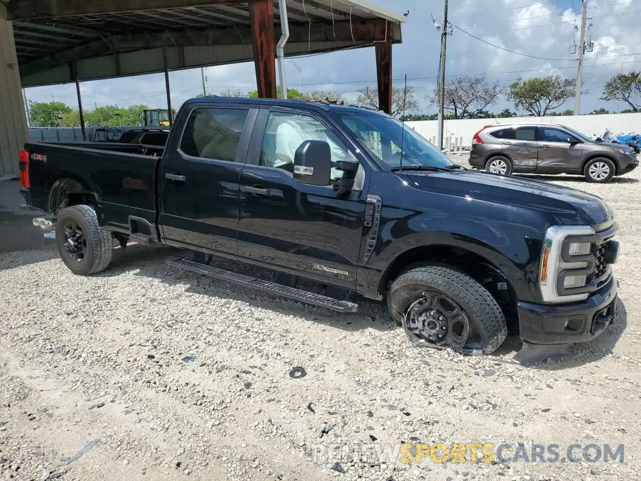 4 Photograph of a damaged car 1FT8W3BT7REF14387 FORD F350 2024
