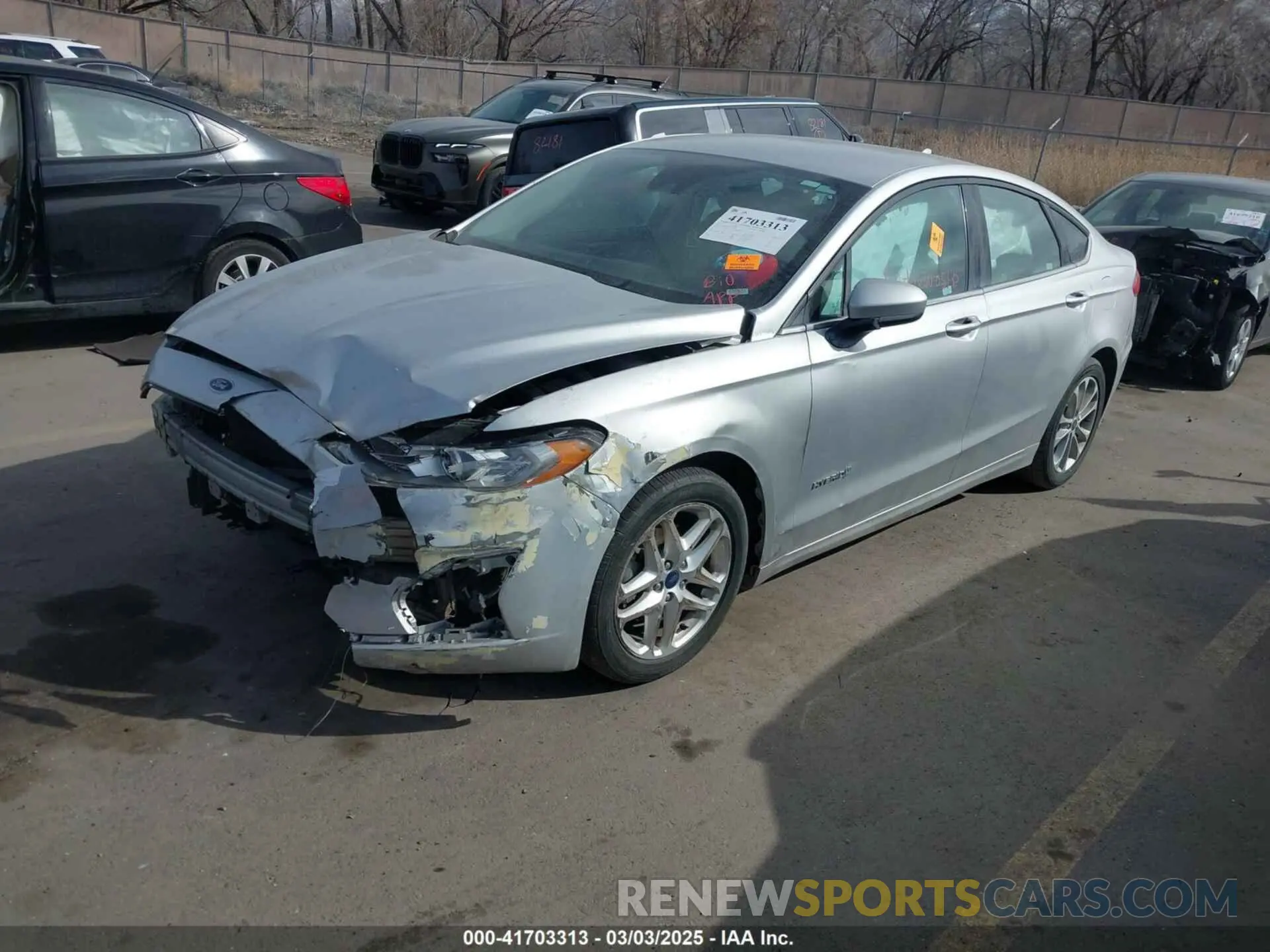 2 Photograph of a damaged car 3FA6P0LU5KR140266 FORD FUSION HYBRID 2019