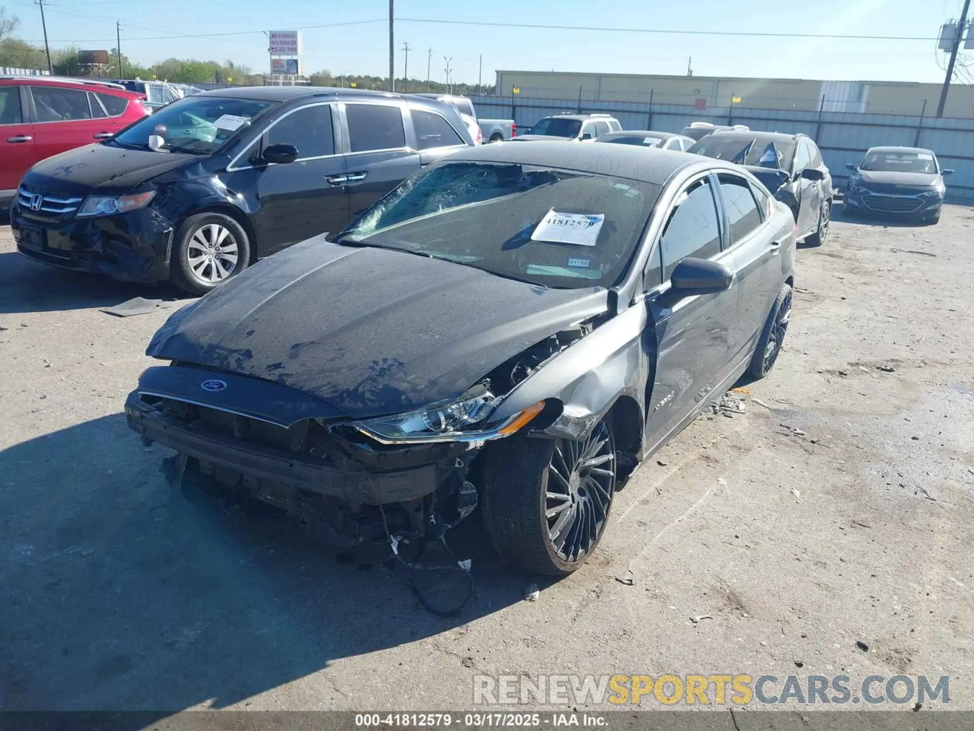 2 Photograph of a damaged car 3FA6P0LU9KR189728 FORD FUSION HYBRID 2019
