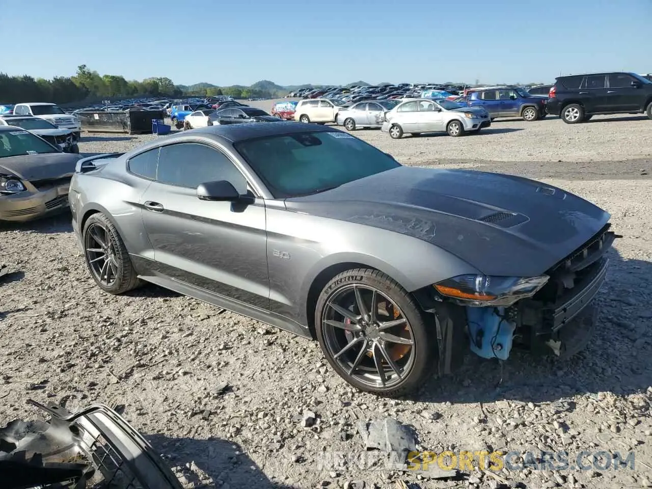 4 Photograph of a damaged car 1FA6P8CF5N5112636 FORD MUSTANG 2022