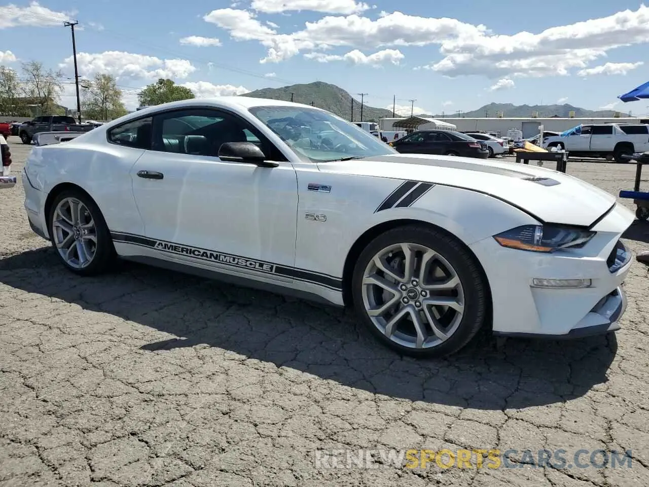 4 Photograph of a damaged car 1FA6P8CF9N5136633 FORD MUSTANG 2022