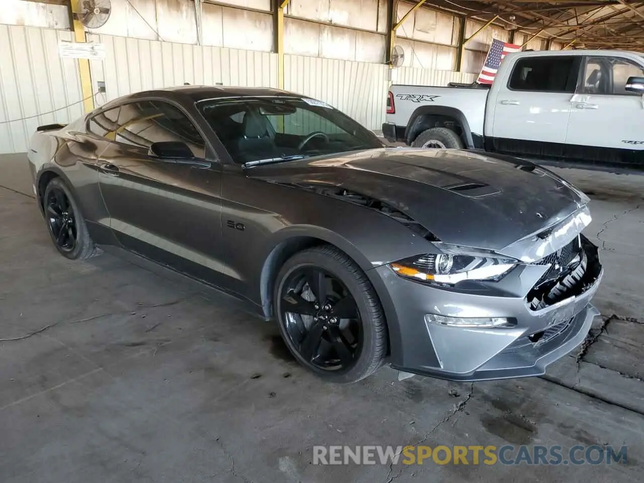 4 Photograph of a damaged car 1FA6P8CF0P5304291 FORD MUSTANG 2023