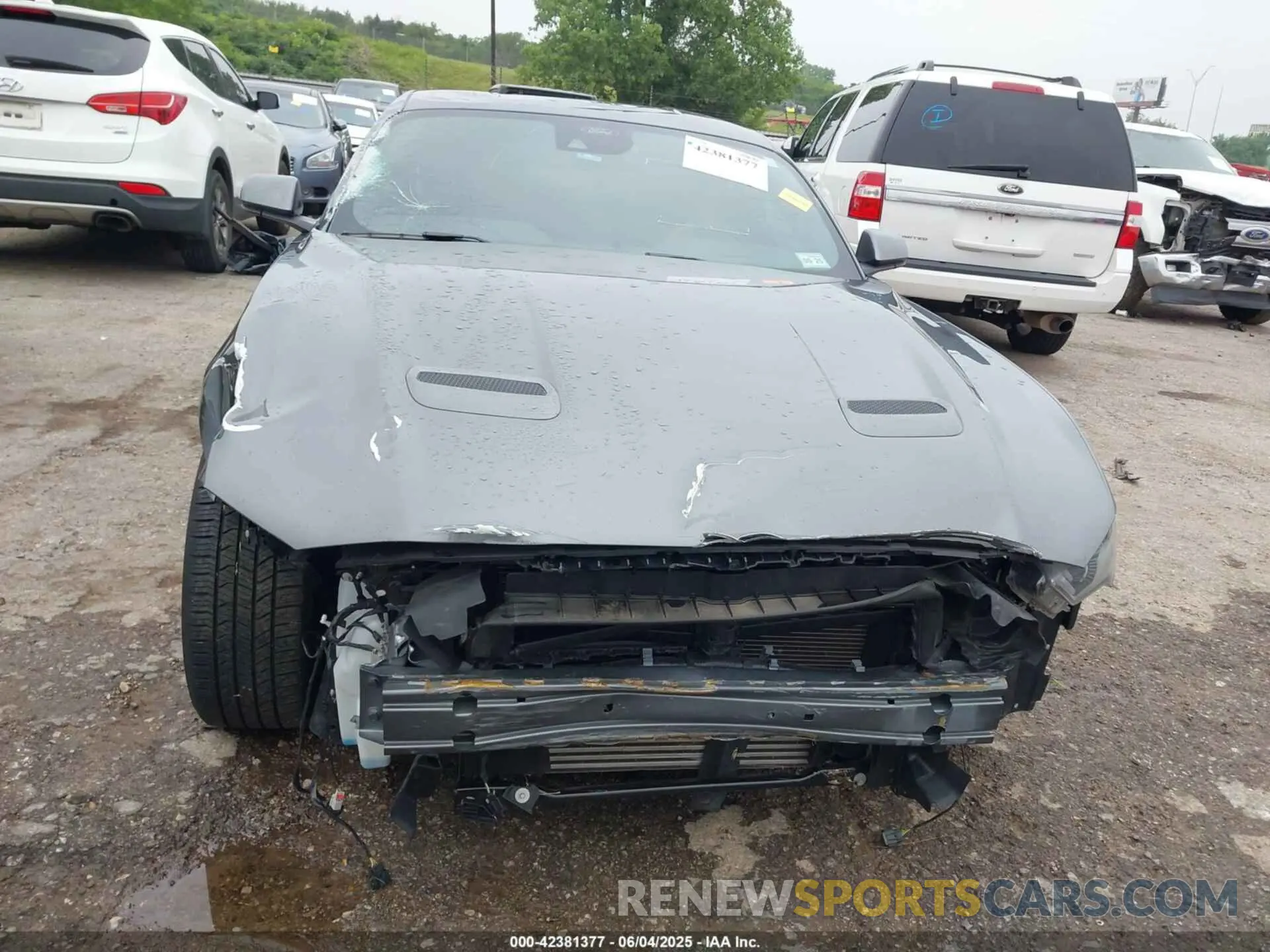 12 Photograph of a damaged car 1FA6P8TH7P5112903 FORD MUSTANG 2023