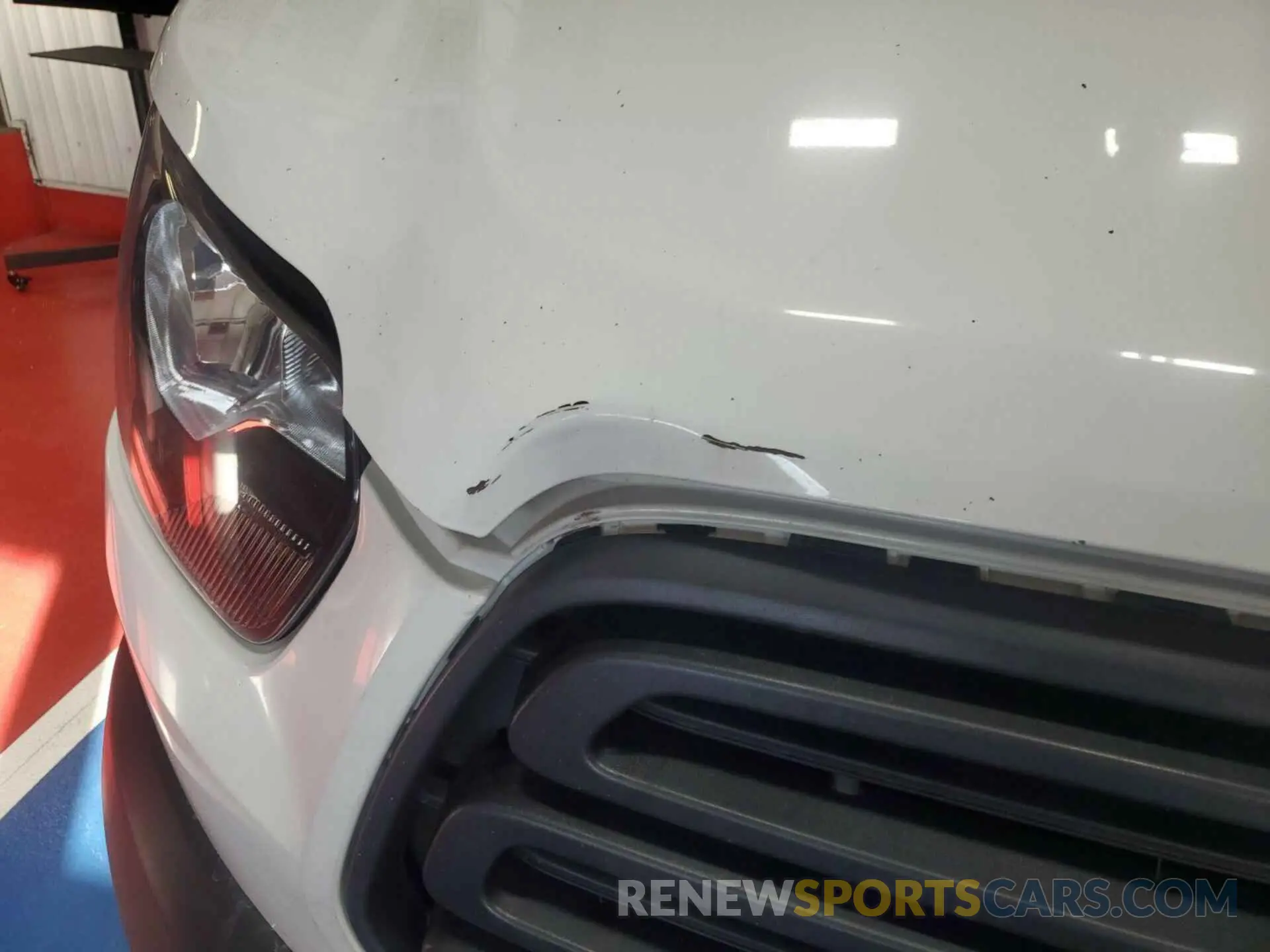 10 Photograph of a damaged car 1FTYE1YM0KKB28313 FORD TRANSIT-150 2019