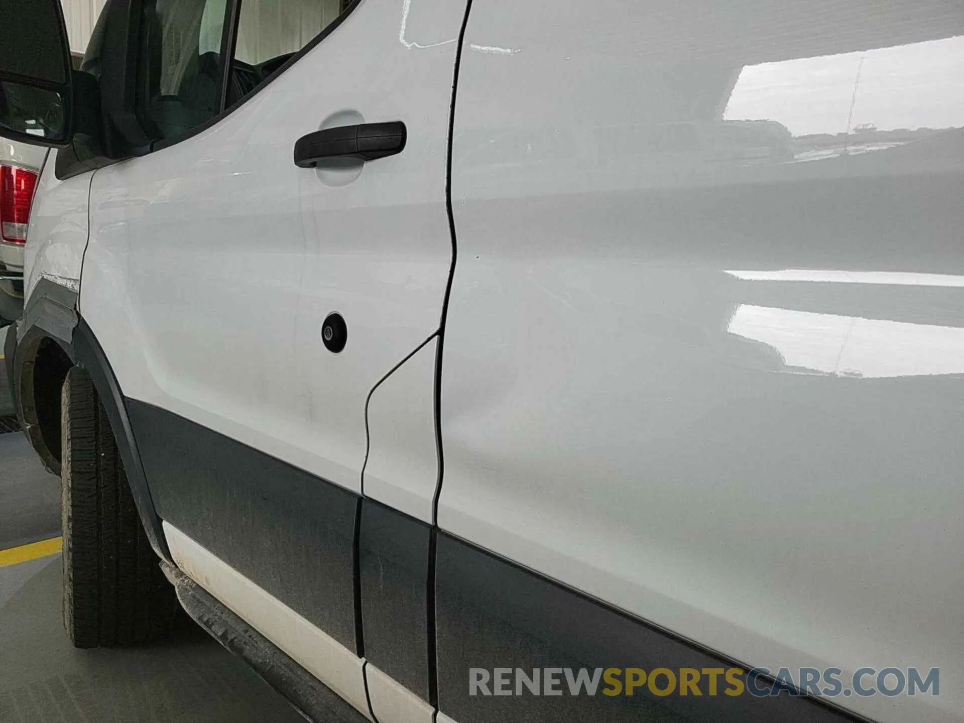23 Photograph of a damaged car 1FTYE1YM6KKB28316 FORD TRANSIT-150 2019