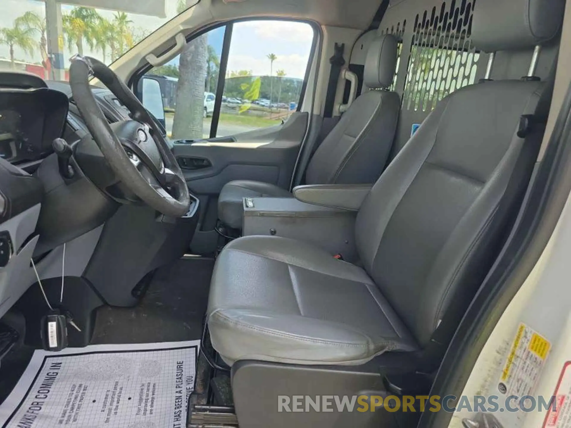 14 Photograph of a damaged car 1FTYE1YM8KKB28303 FORD TRANSIT 2019