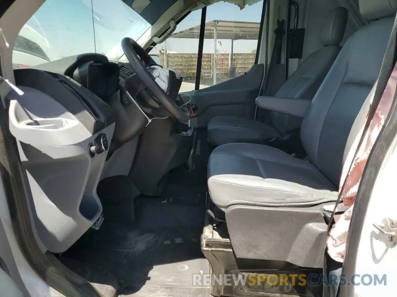 7 Photograph of a damaged car 1FTYE2CM8KKA25606 FORD TRANSIT 2019