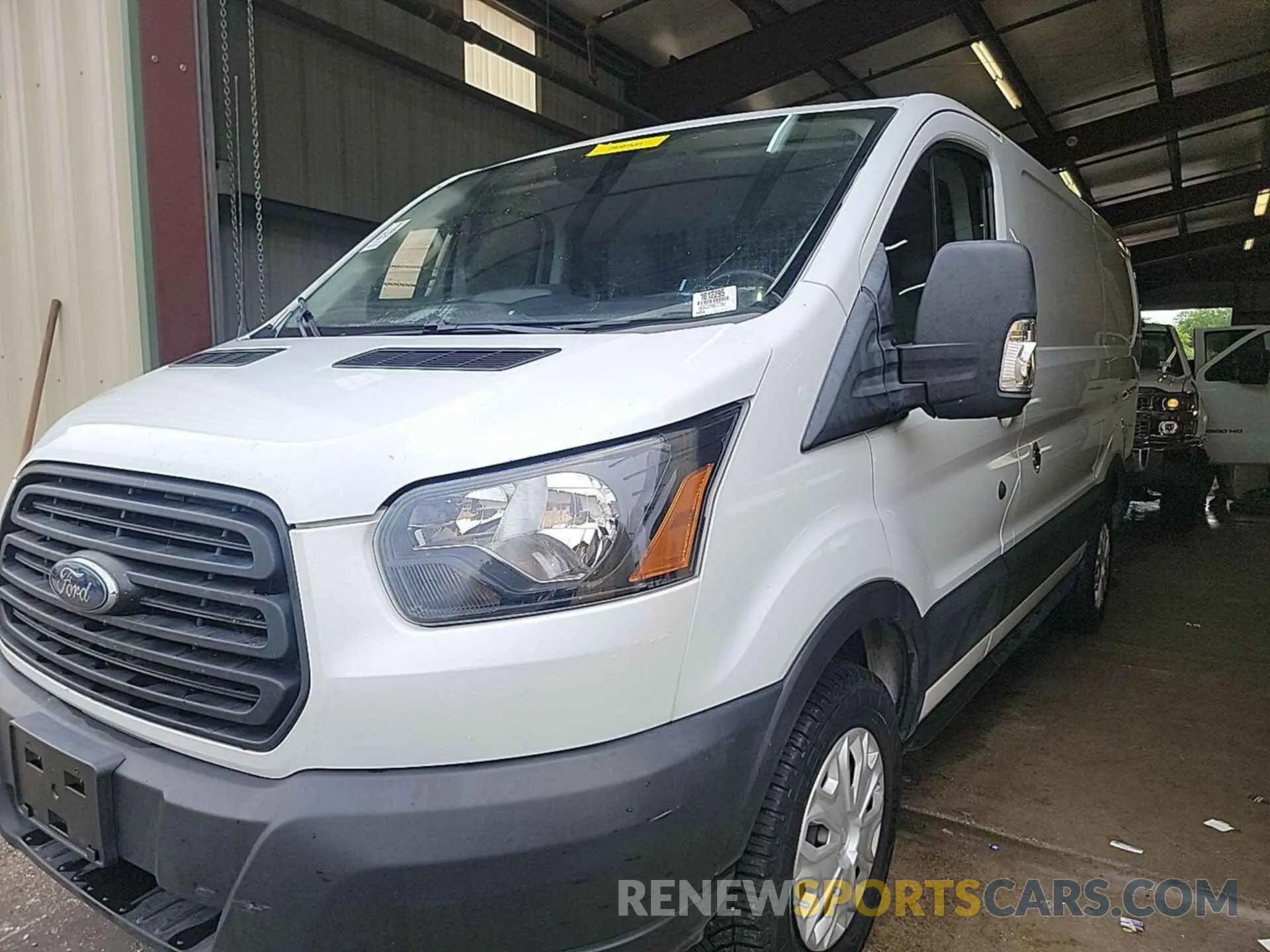 23 Photograph of a damaged car 1FTYR1YG2KKB08577 FORD TRANSIT 2019