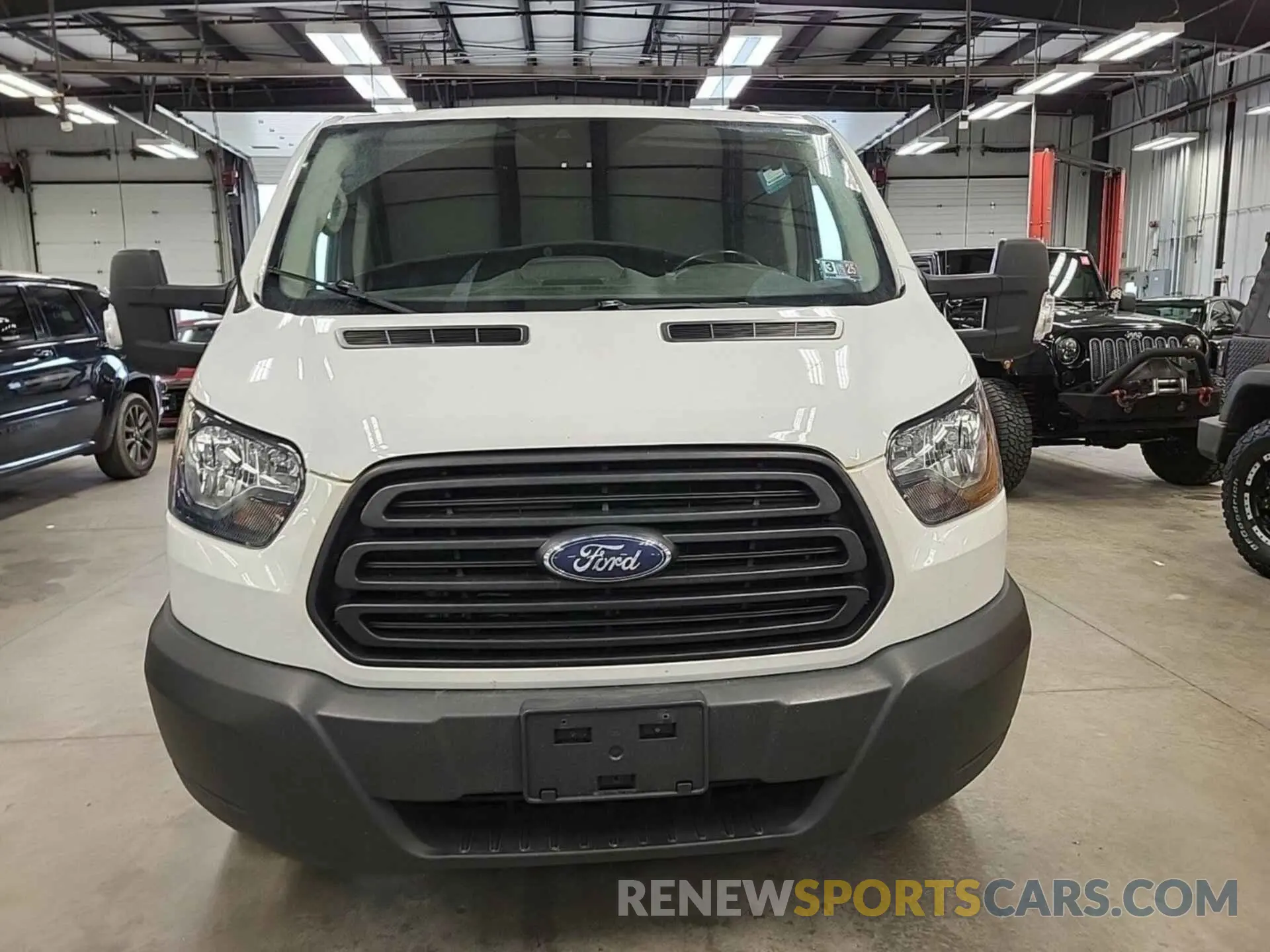 28 Photograph of a damaged car 1FTYR1YG4KKB43489 FORD TRANSIT 2019