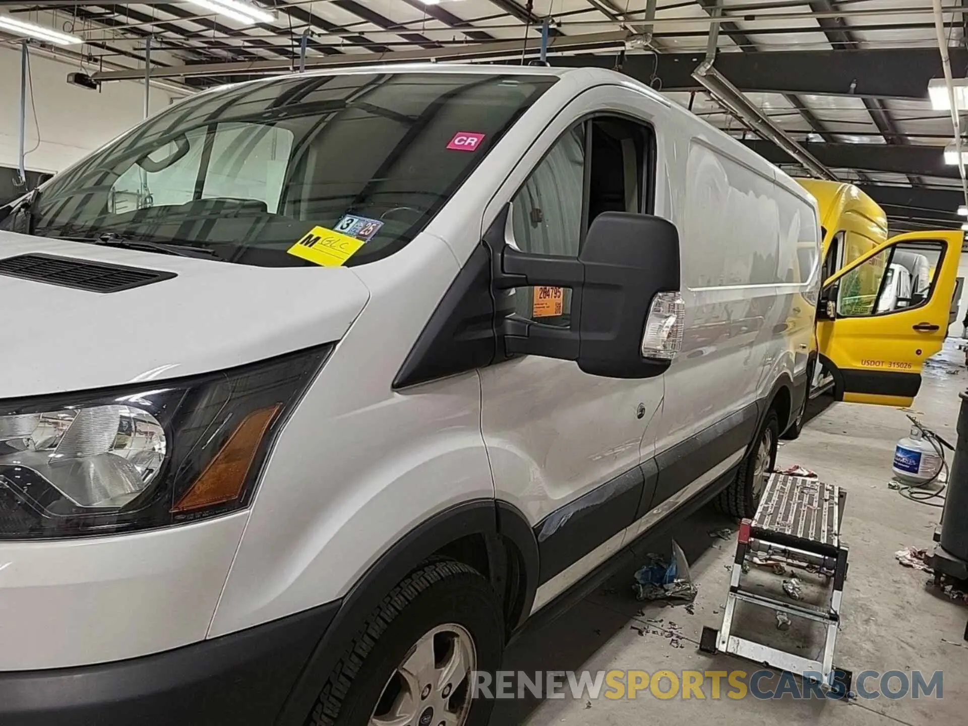 32 Photograph of a damaged car 1FTYR1YG4KKB43489 FORD TRANSIT 2019
