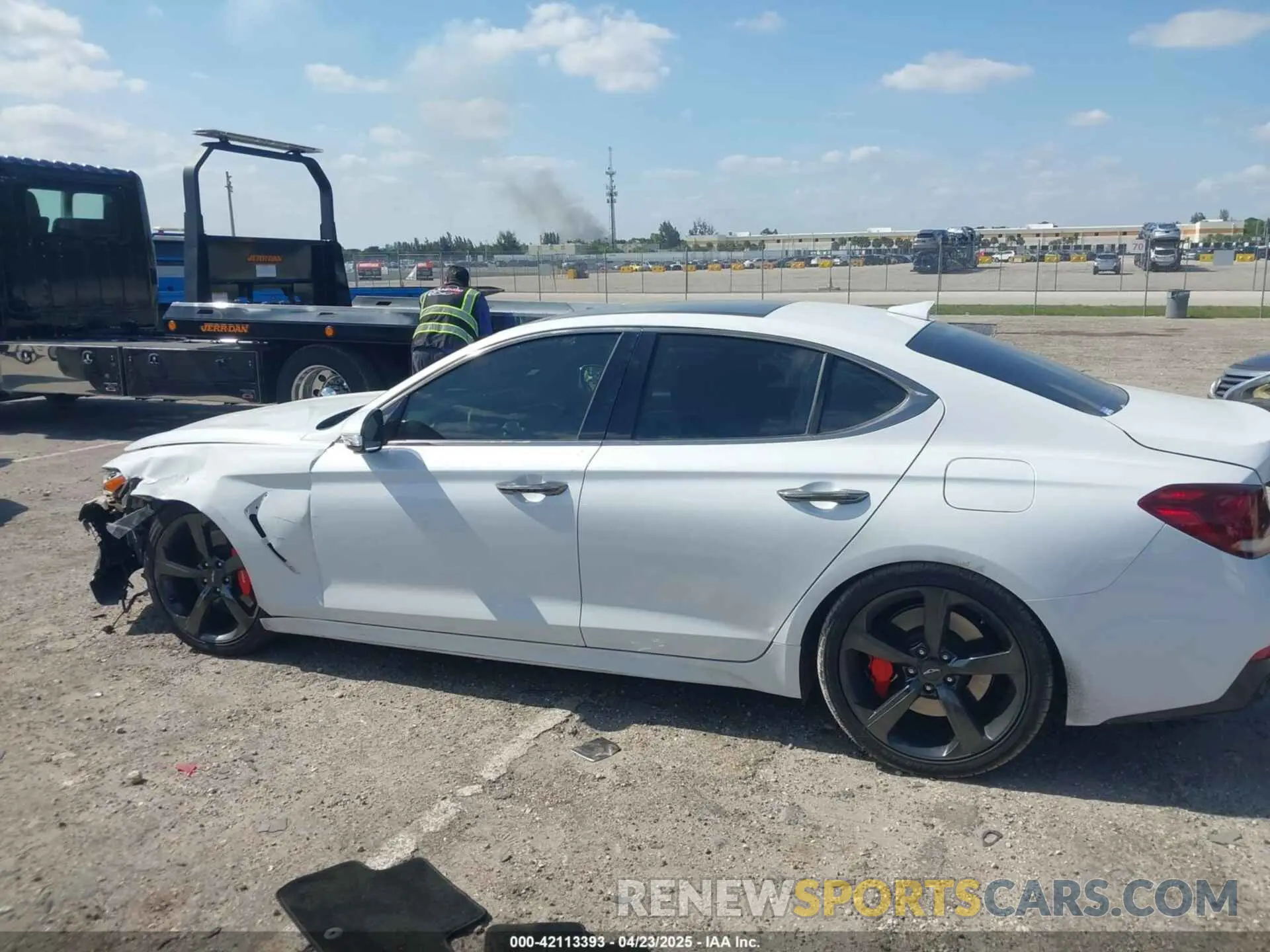 14 Photograph of a damaged car KMTG34LE0KU034232 GENESIS G70 2019