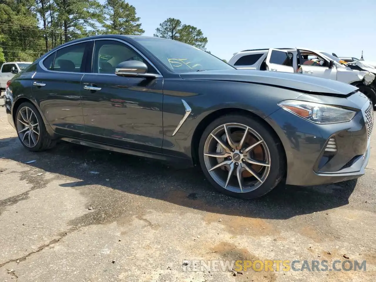4 Photograph of a damaged car KMTG34LE1KU012157 GENESIS G70 2019