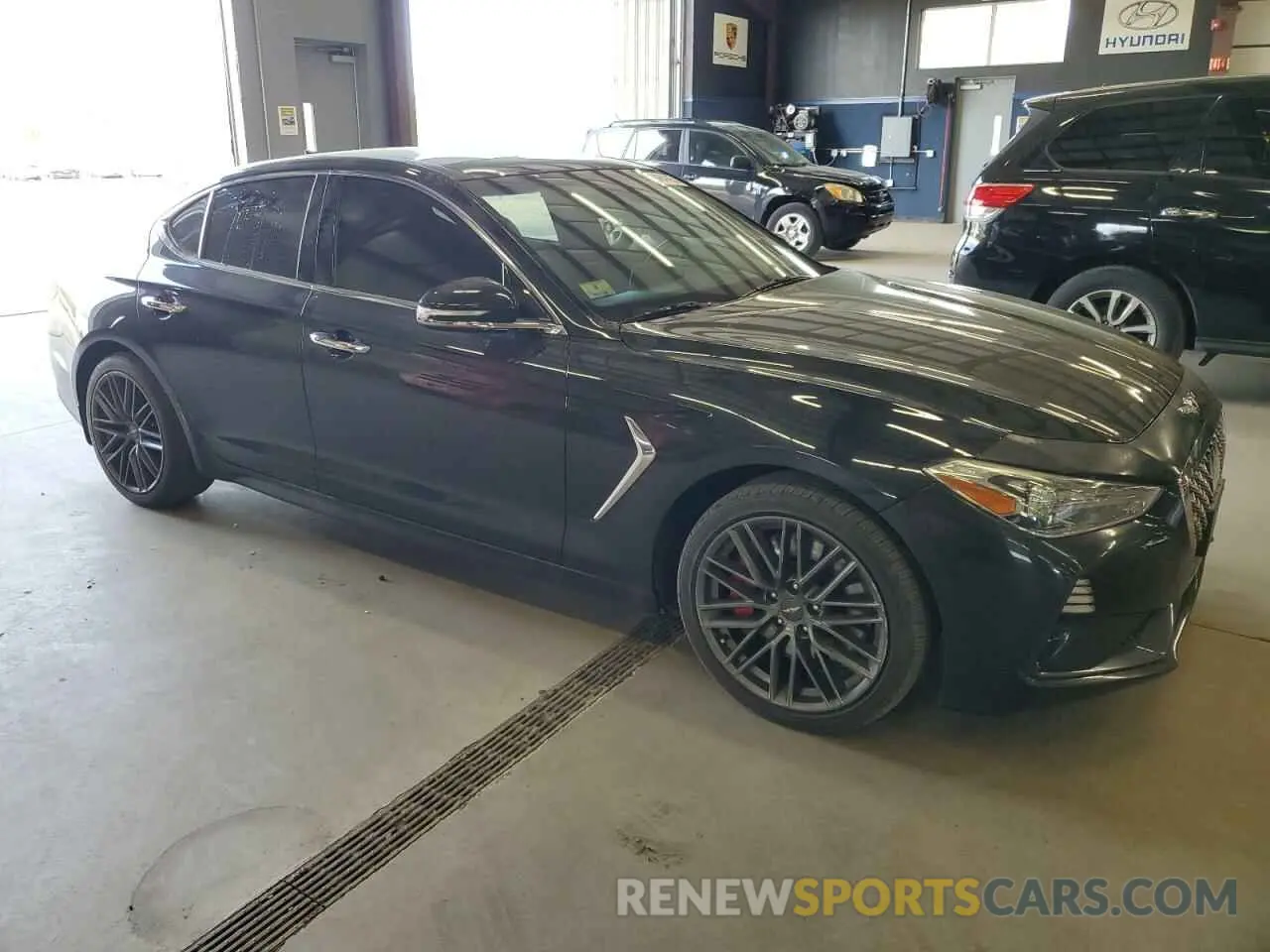4 Photograph of a damaged car KMTG74LE6KU013986 GENESIS G70 2019