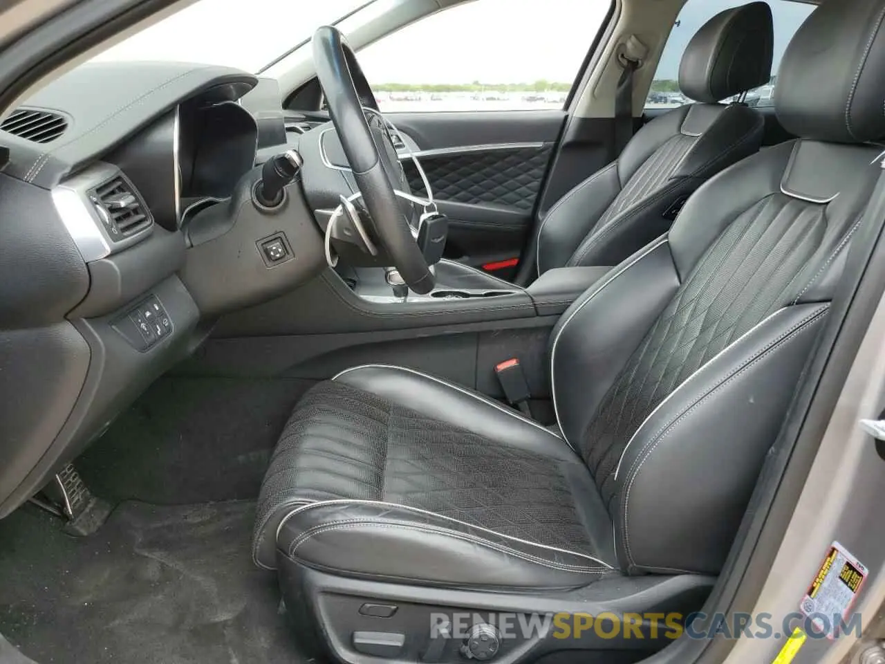 7 Photograph of a damaged car KMTG34LE2LU063944 GENESIS G70 2020