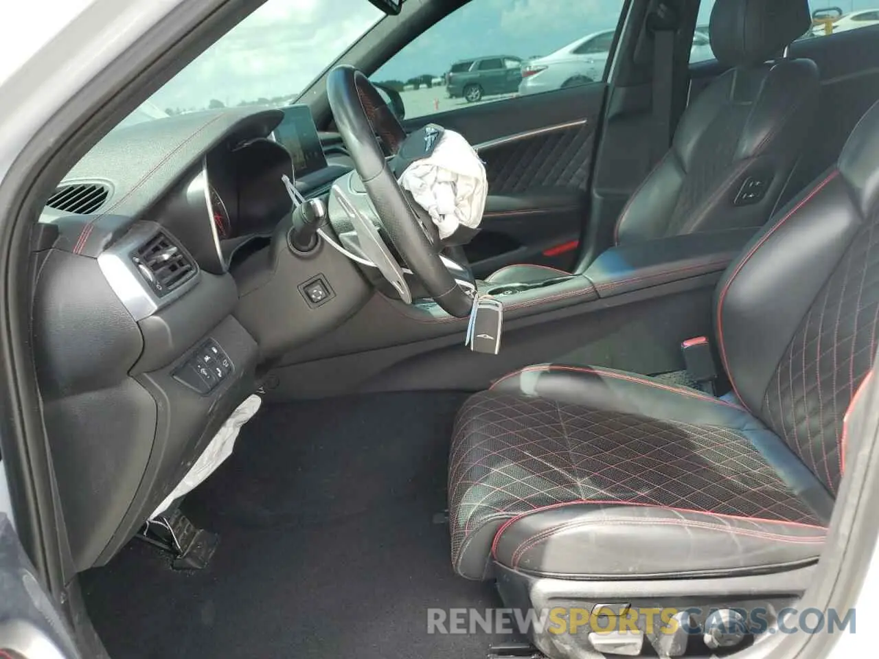 7 Photograph of a damaged car KMTG34LE7LU049070 GENESIS G70 2020
