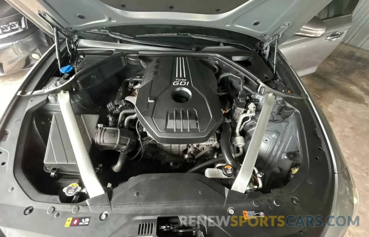 7 Photograph of a damaged car KMTG34LAXMU074866 GENESIS G70 2021