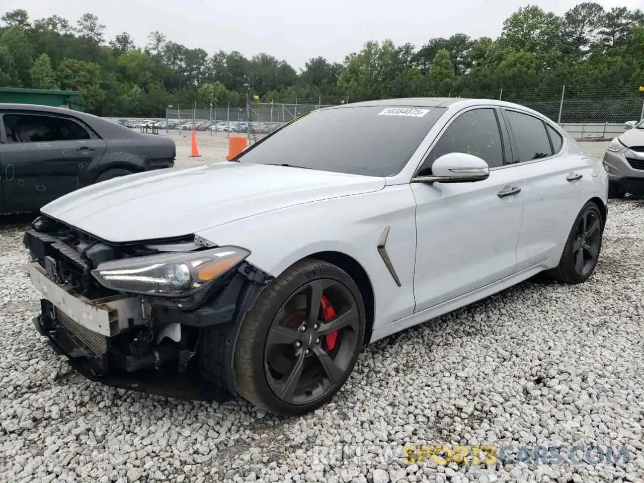 1 Photograph of a damaged car KMTG34LE1MU072717 GENESIS G70 2021