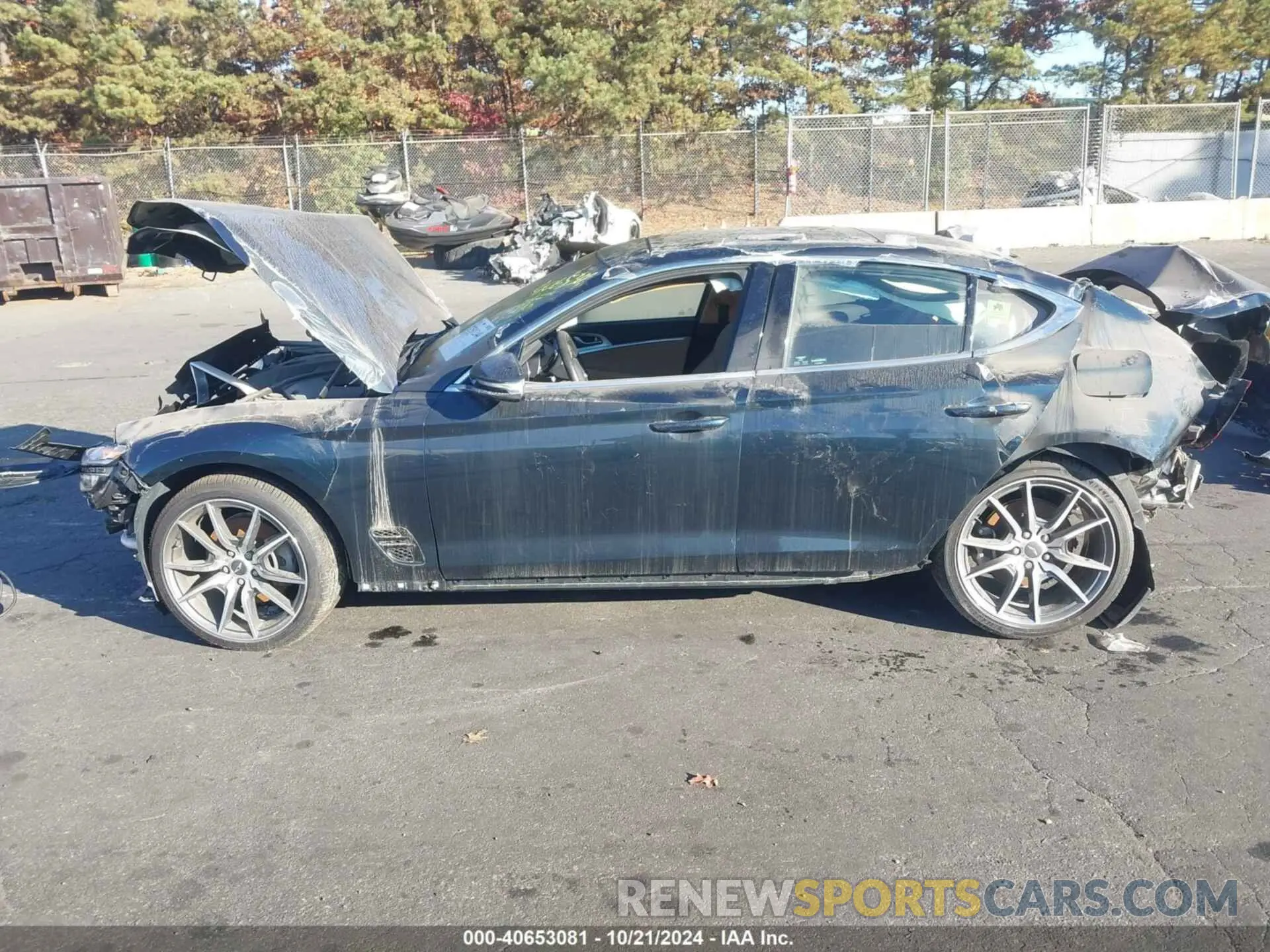13 Photograph of a damaged car KMTG34TA1NU092657 GENESIS G70 2022