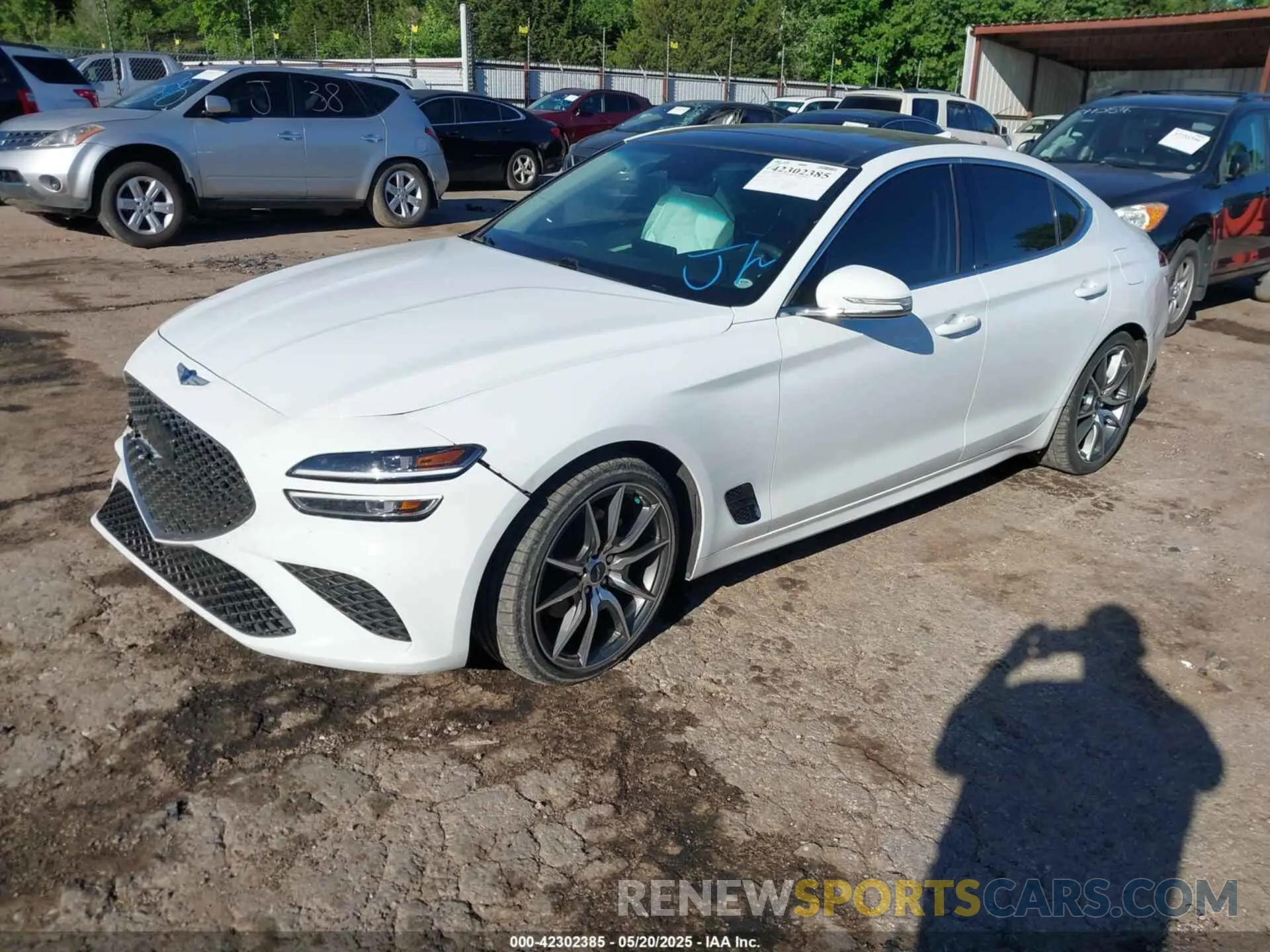 2 Photograph of a damaged car KMTG34TA2NU103990 GENESIS G70 2022