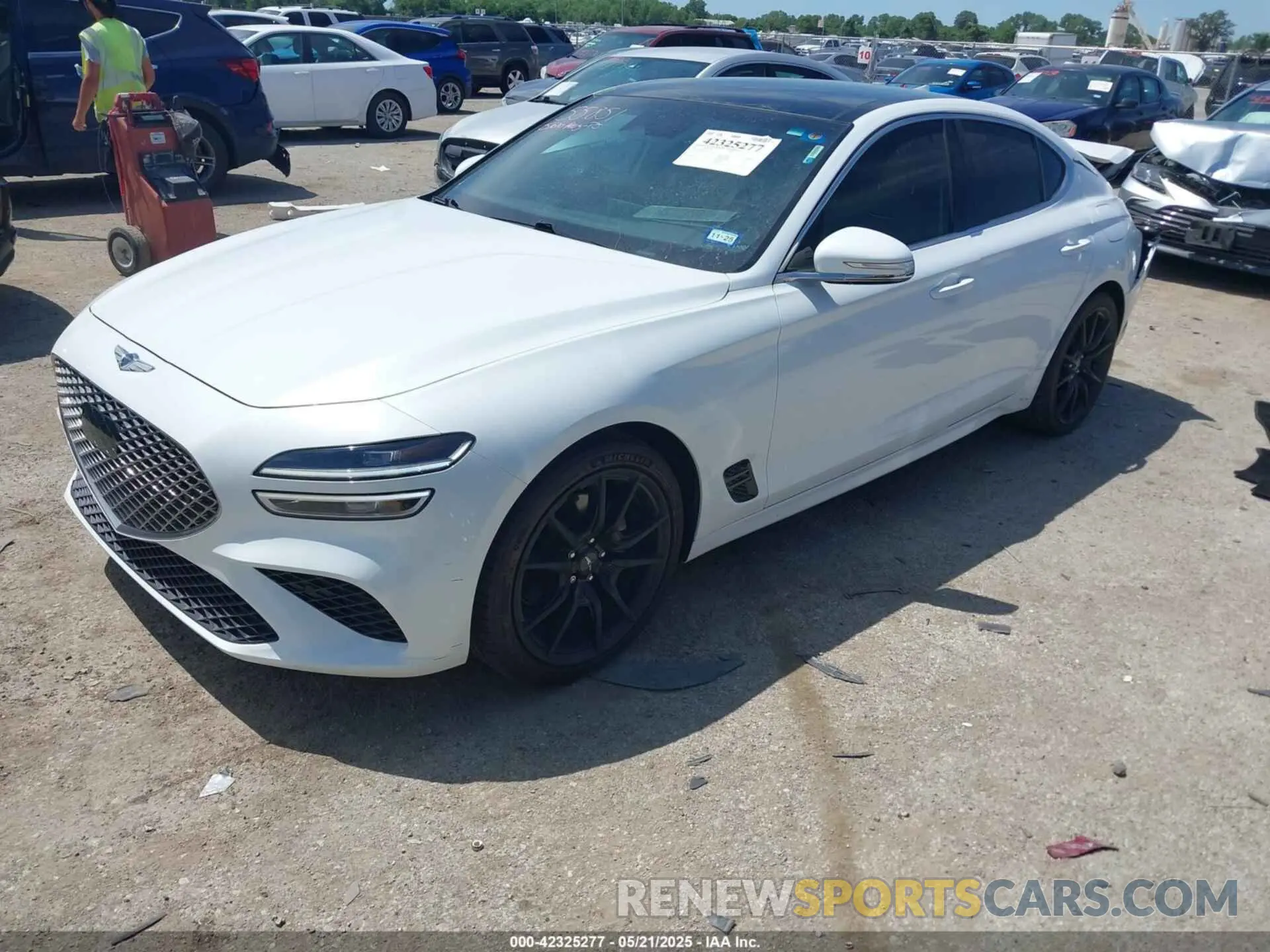2 Photograph of a damaged car KMTG34TA5NU103935 GENESIS G70 2022