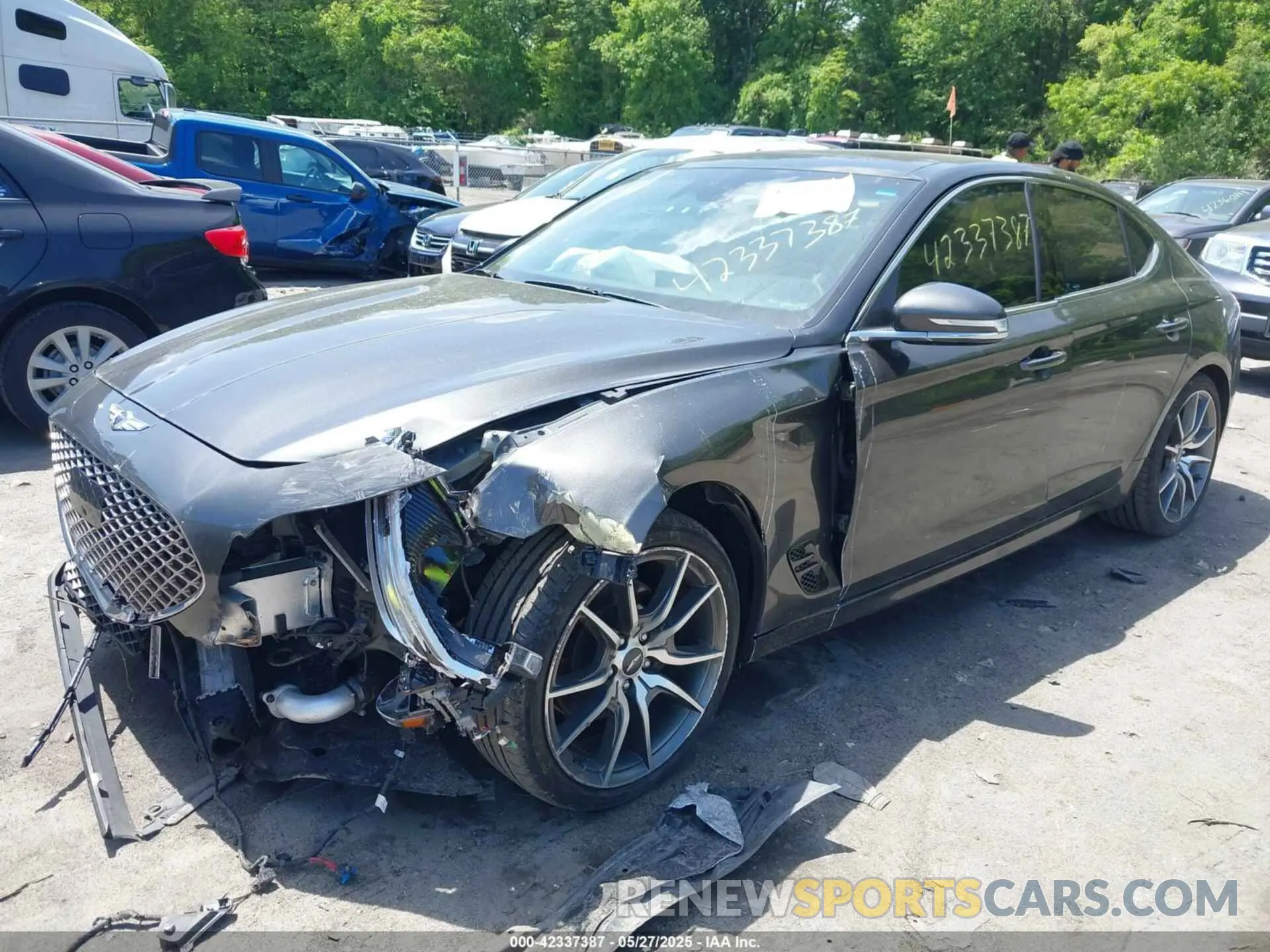 2 Photograph of a damaged car KMTG34TA7NU101863 GENESIS G70 2022