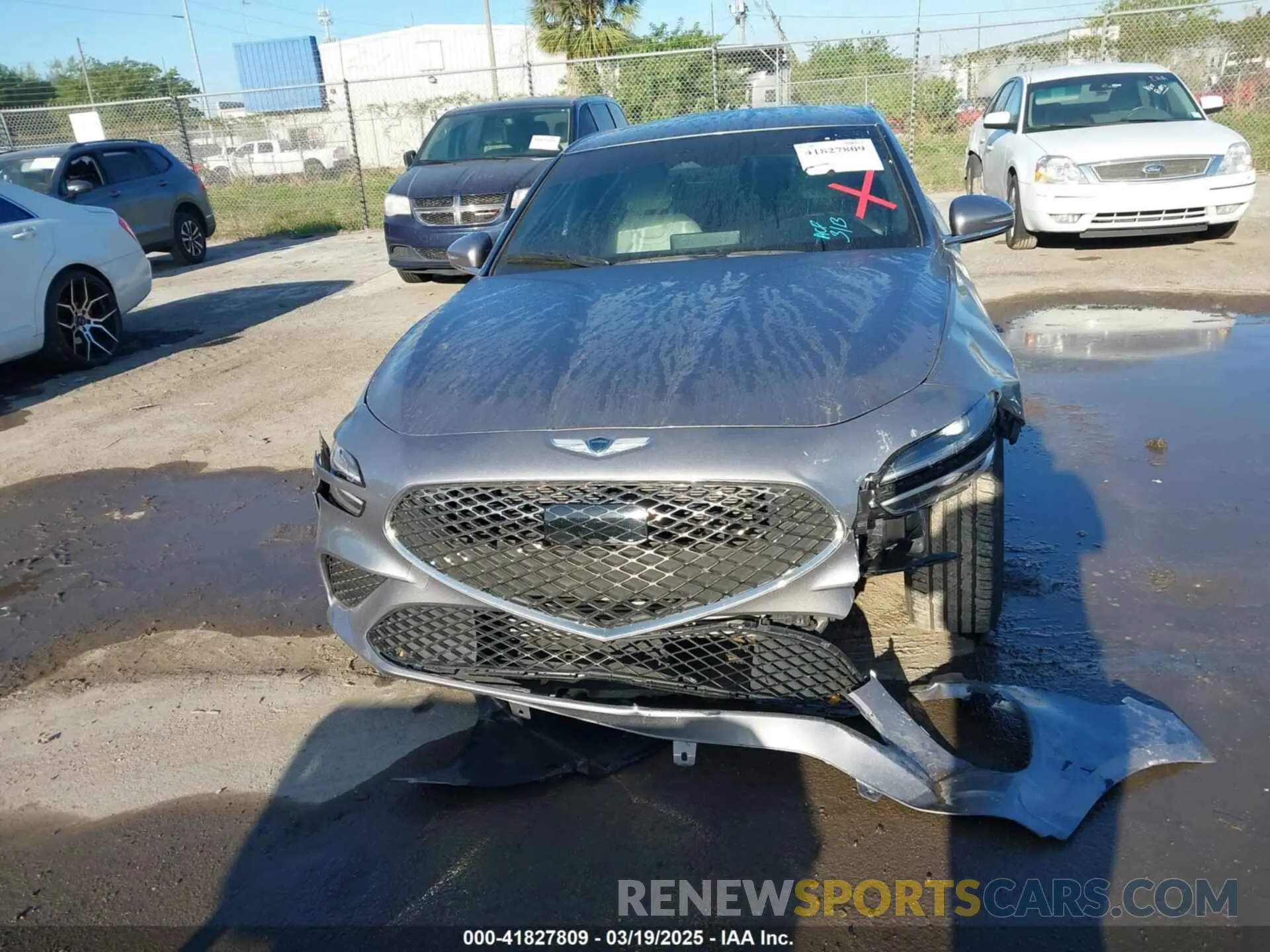 12 Photograph of a damaged car KMTG34TA2PU127032 GENESIS G70 2023