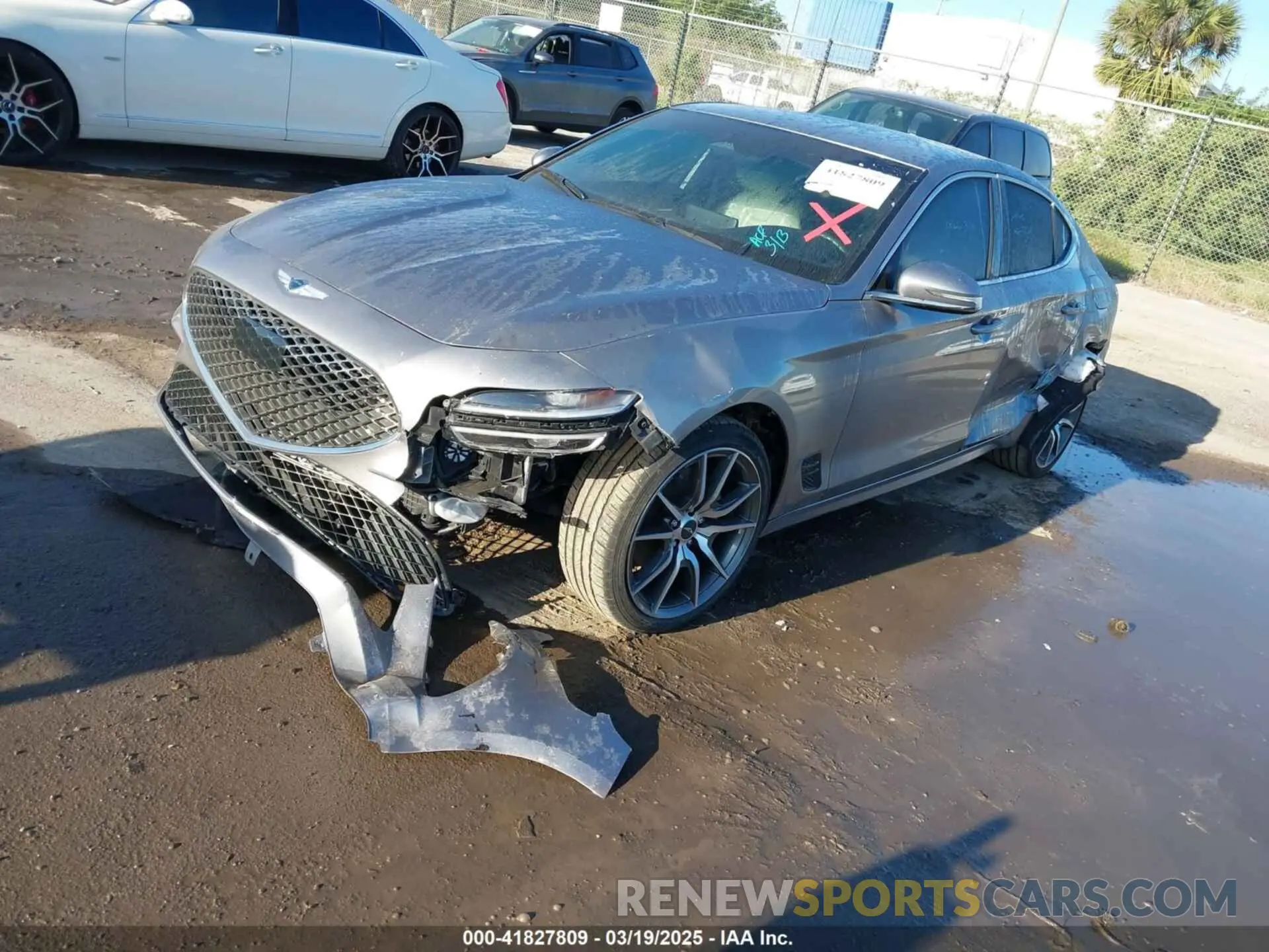 2 Photograph of a damaged car KMTG34TA2PU127032 GENESIS G70 2023