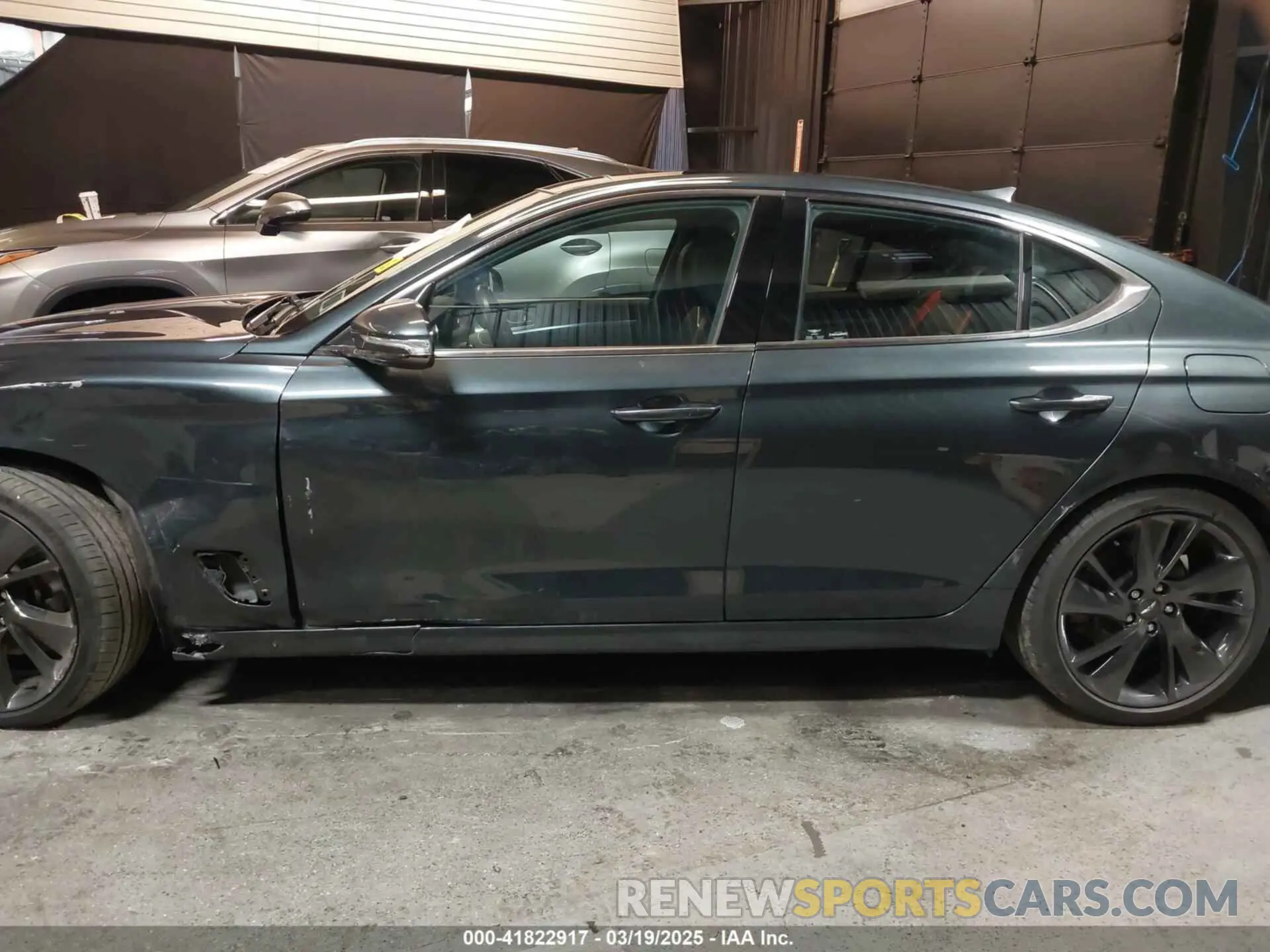 14 Photograph of a damaged car KMTG34TA3PU115553 GENESIS G70 2023