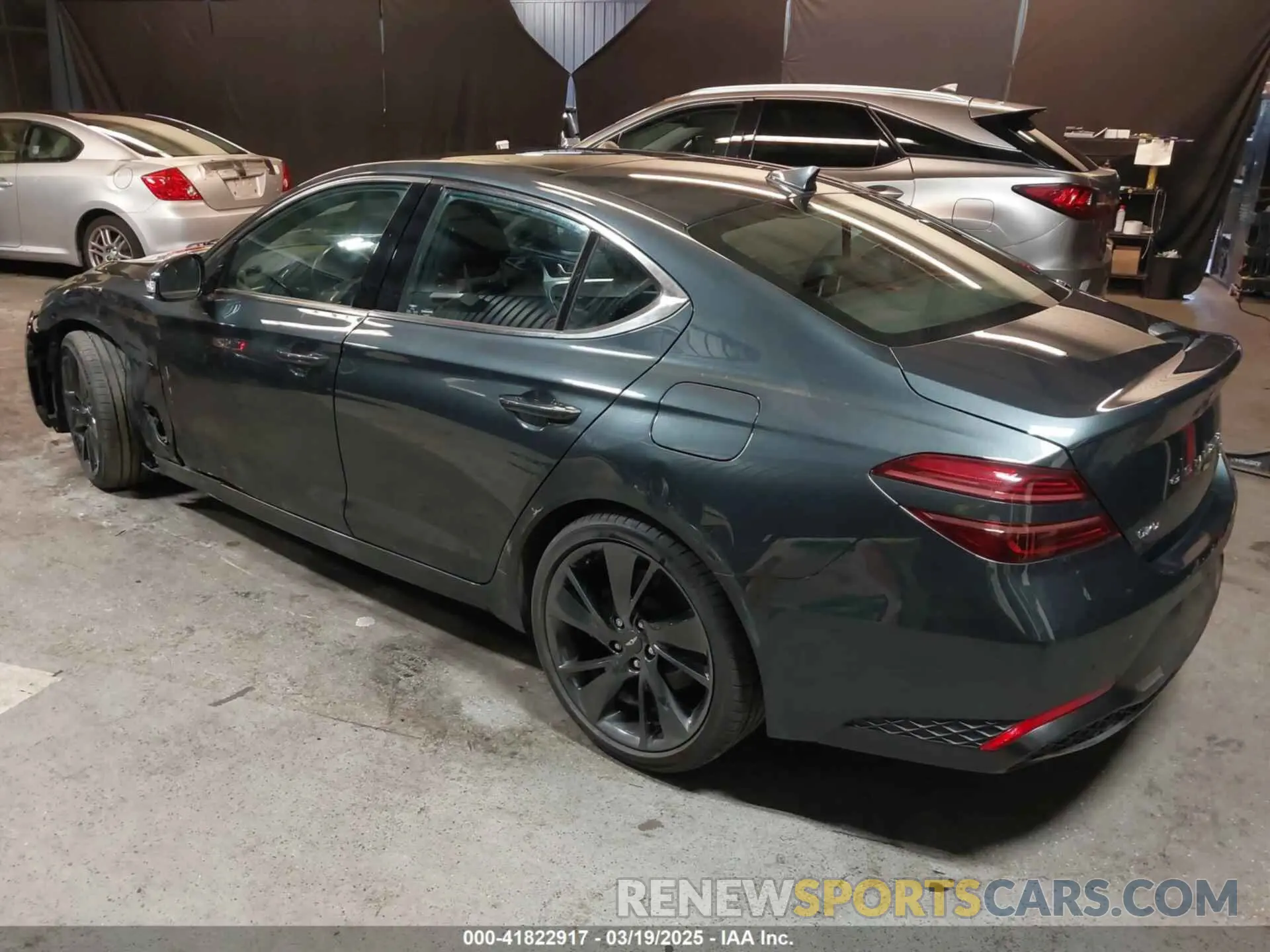 3 Photograph of a damaged car KMTG34TA3PU115553 GENESIS G70 2023
